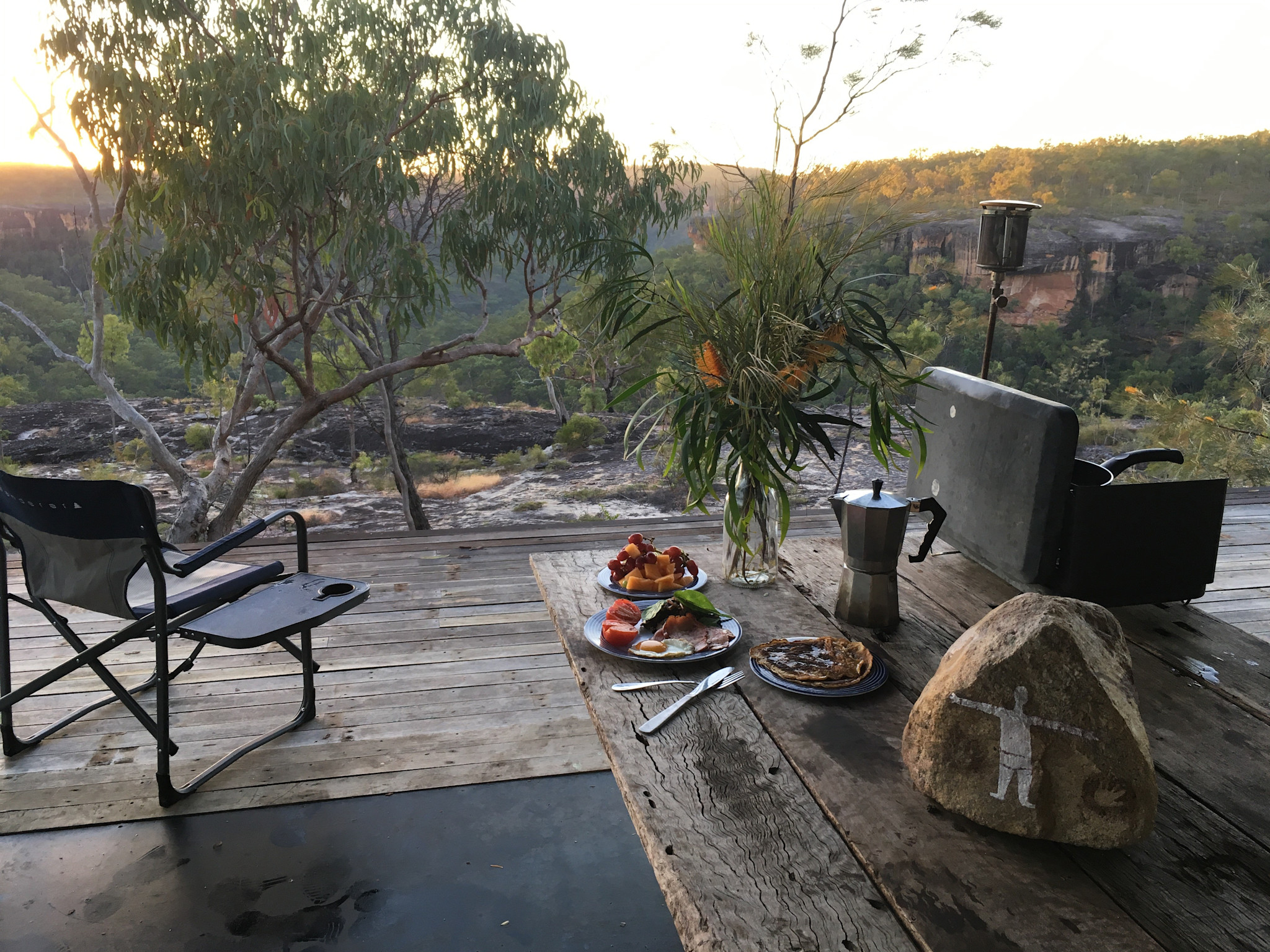 Camping off-grid at an ancient rock-art site in Tropical North Queensland with Jarramali Rock Art Tours © Tourism Australia