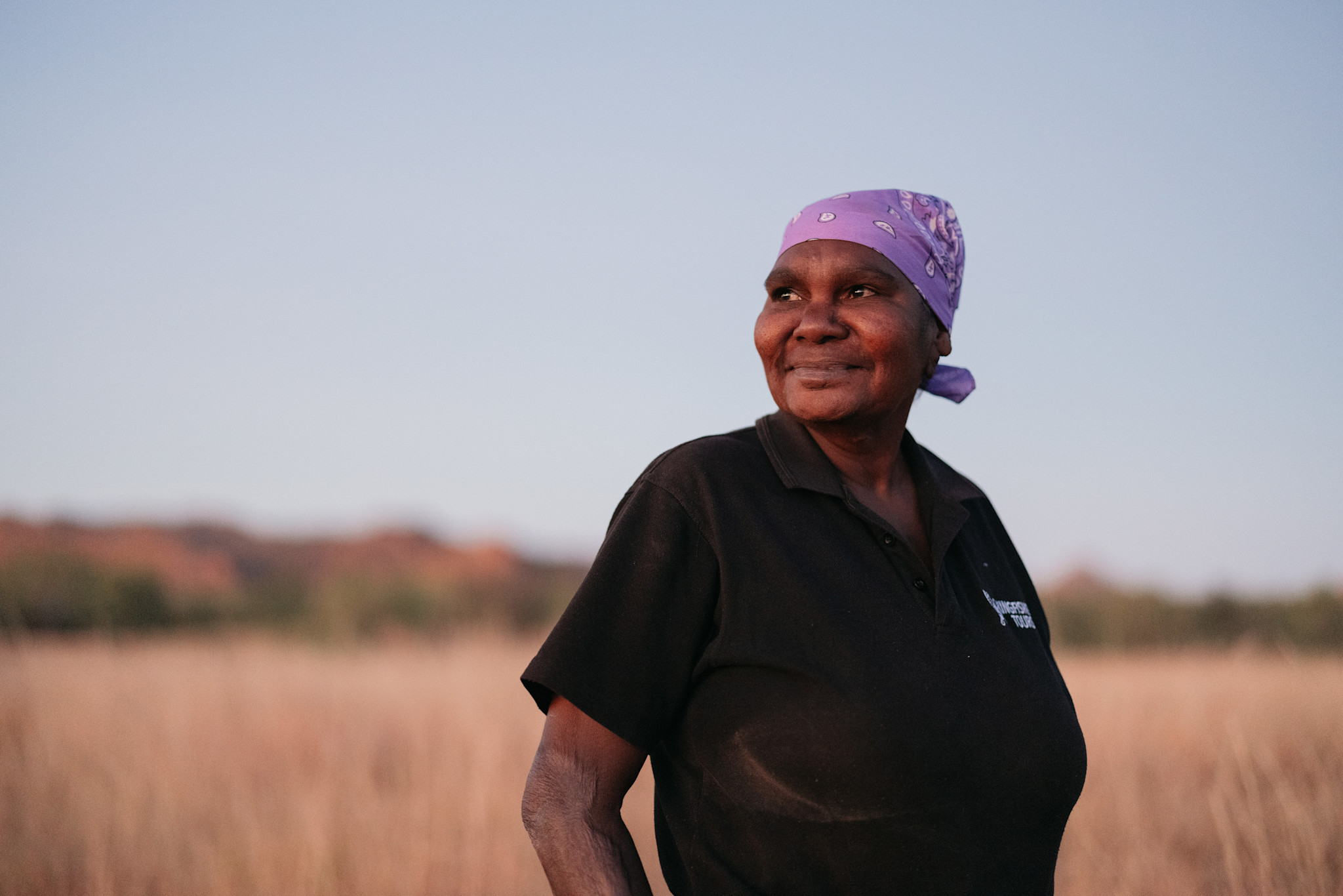 Head guide of Kingfisher Tours Garingbaar, Bec Sampi, admiring landscapes in Western Australia © Tourism Australia