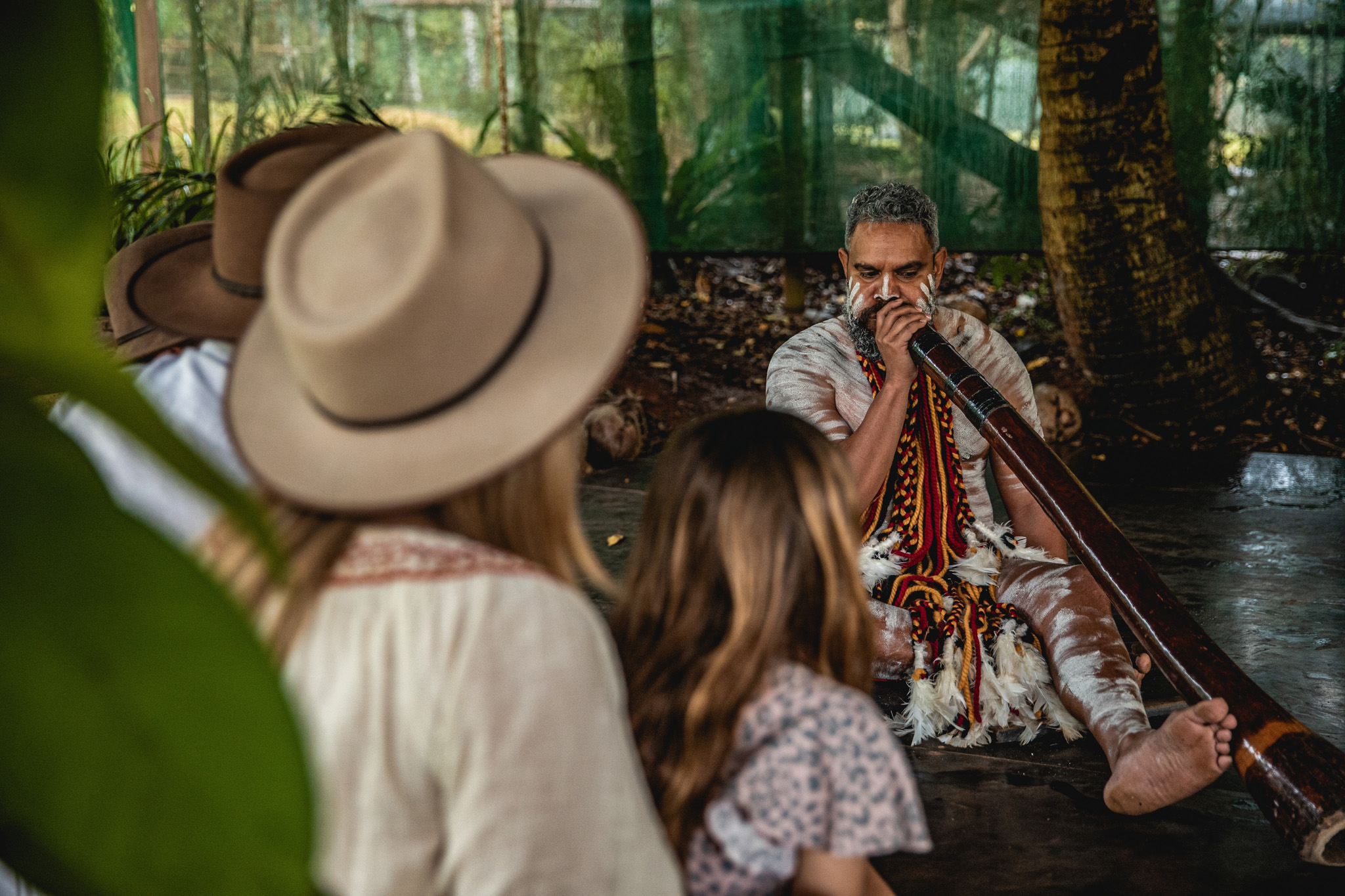 Guide playing the didgeridoo at Pamagirri Aboriginal Experience at Rainforestation Nature Park, Kuranda, Queensland
