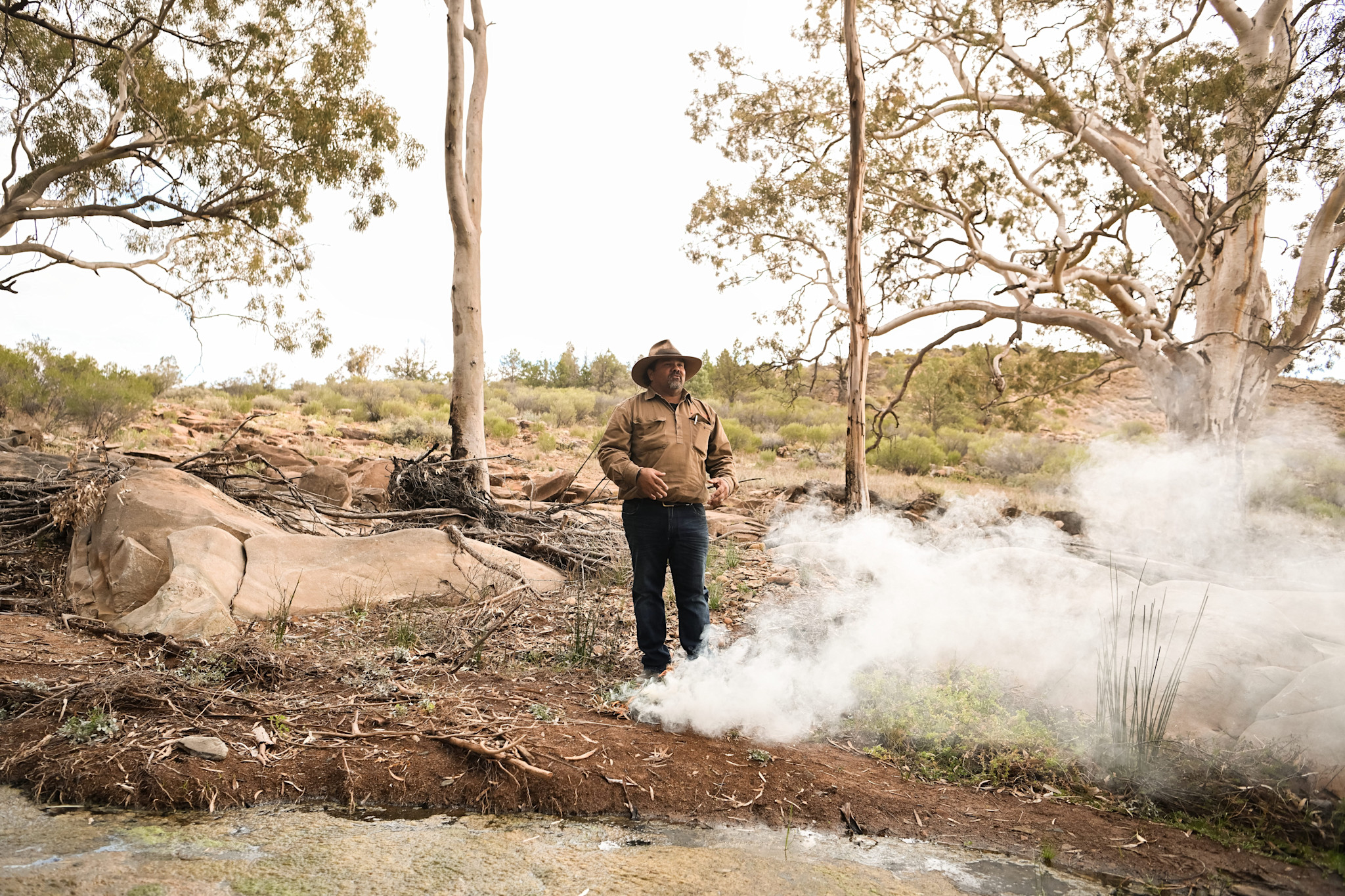 A traditional smoking ceremony with Kristian Coulthard, Wadna, Ikara-Flinders Ranges, South Australia © Tourism Australia
