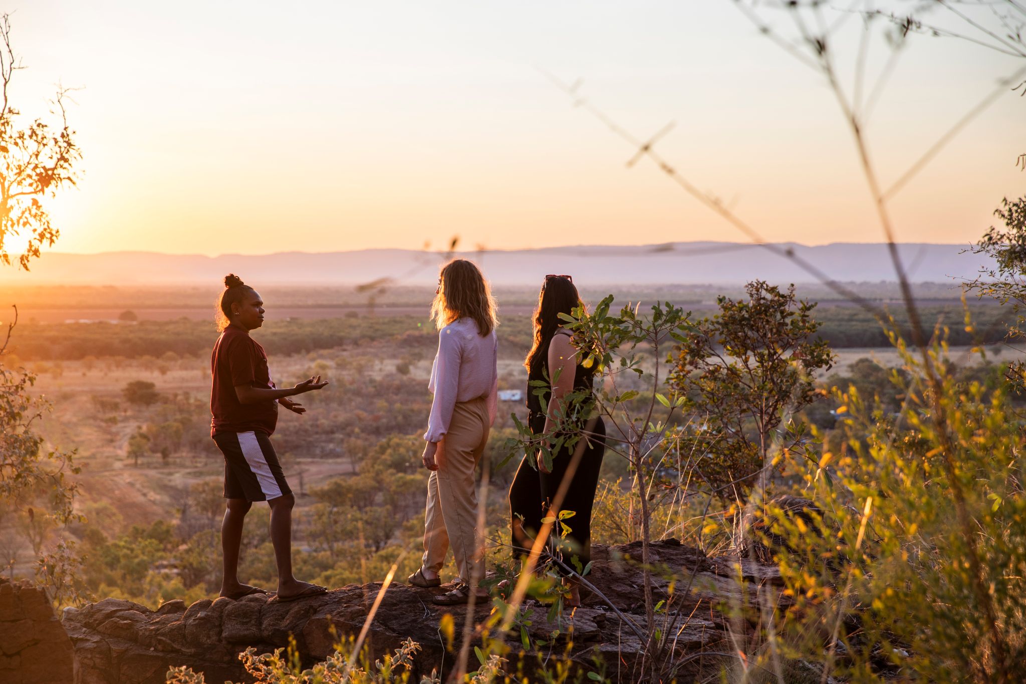 Taking in a spectacular view over the countryside with an Aboriginal guide from Waringarri Aboriginal Arts, Western Australia © Tourism Australia