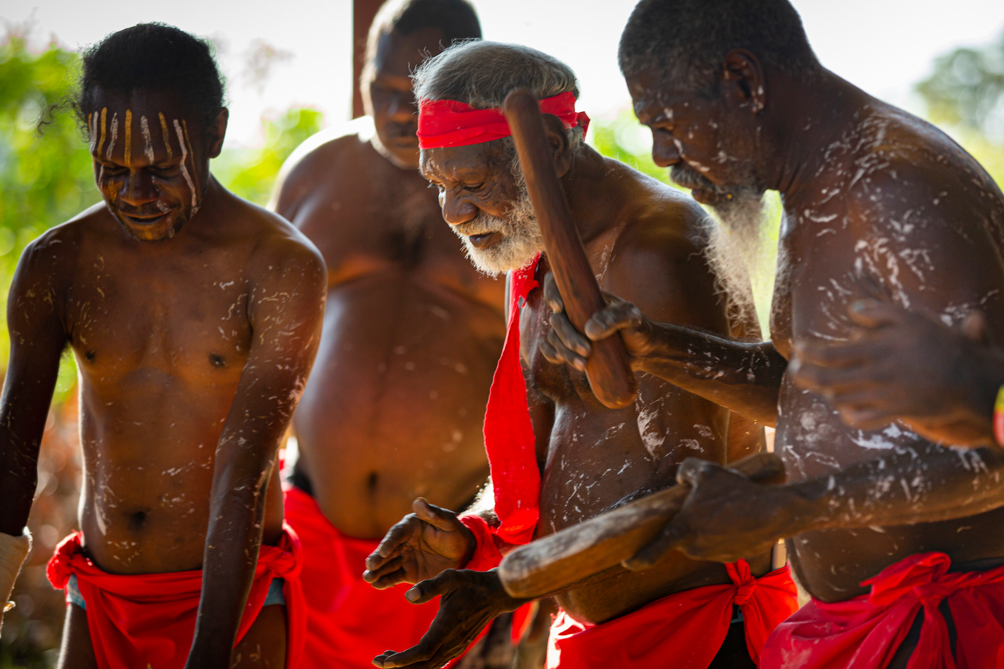 A traditional Tiwi dance ceremony on a SeaLink NT Tiwi by Design tour, NT © Tourism Australia 