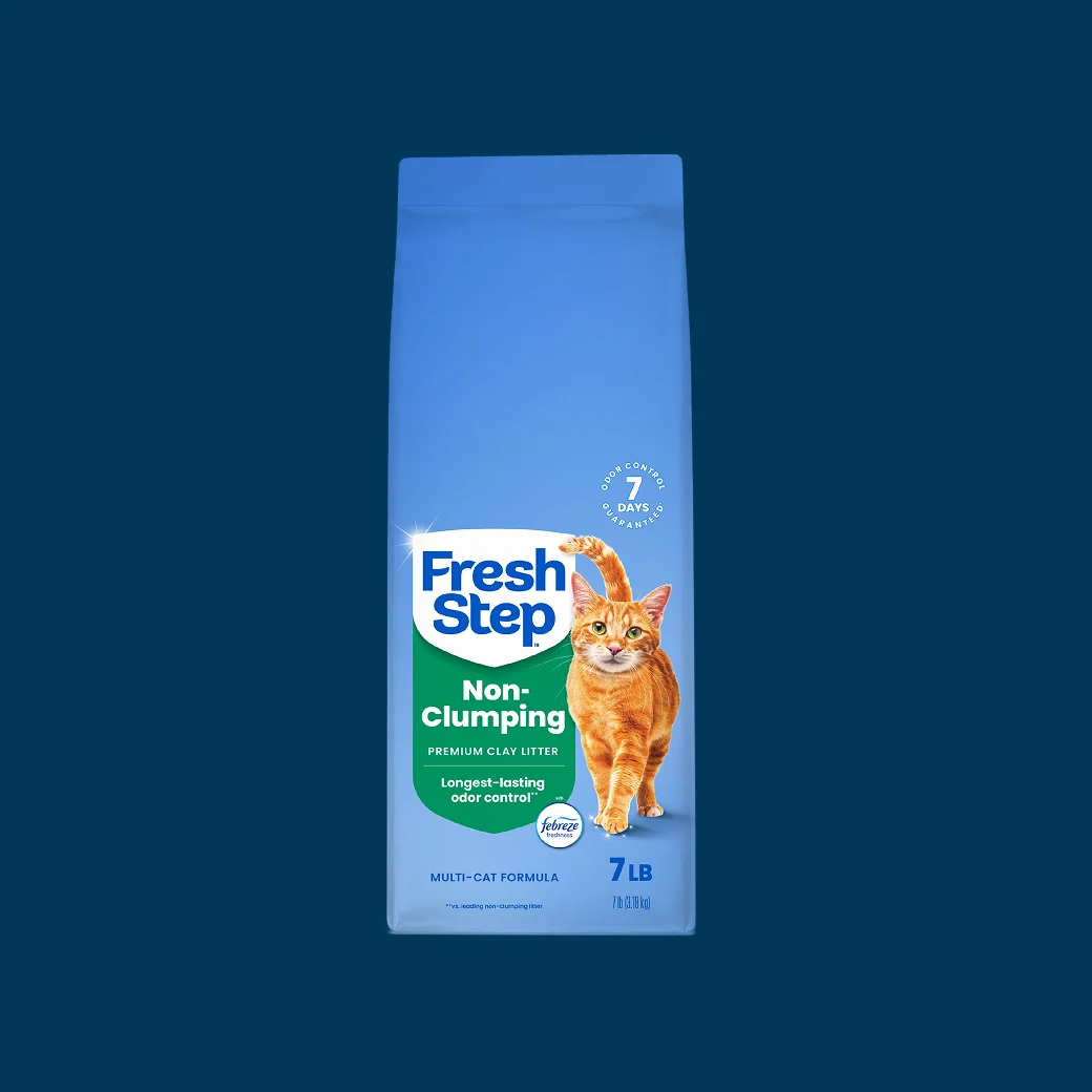 A box of Fresh Step non-clumping cat litter with a blue background