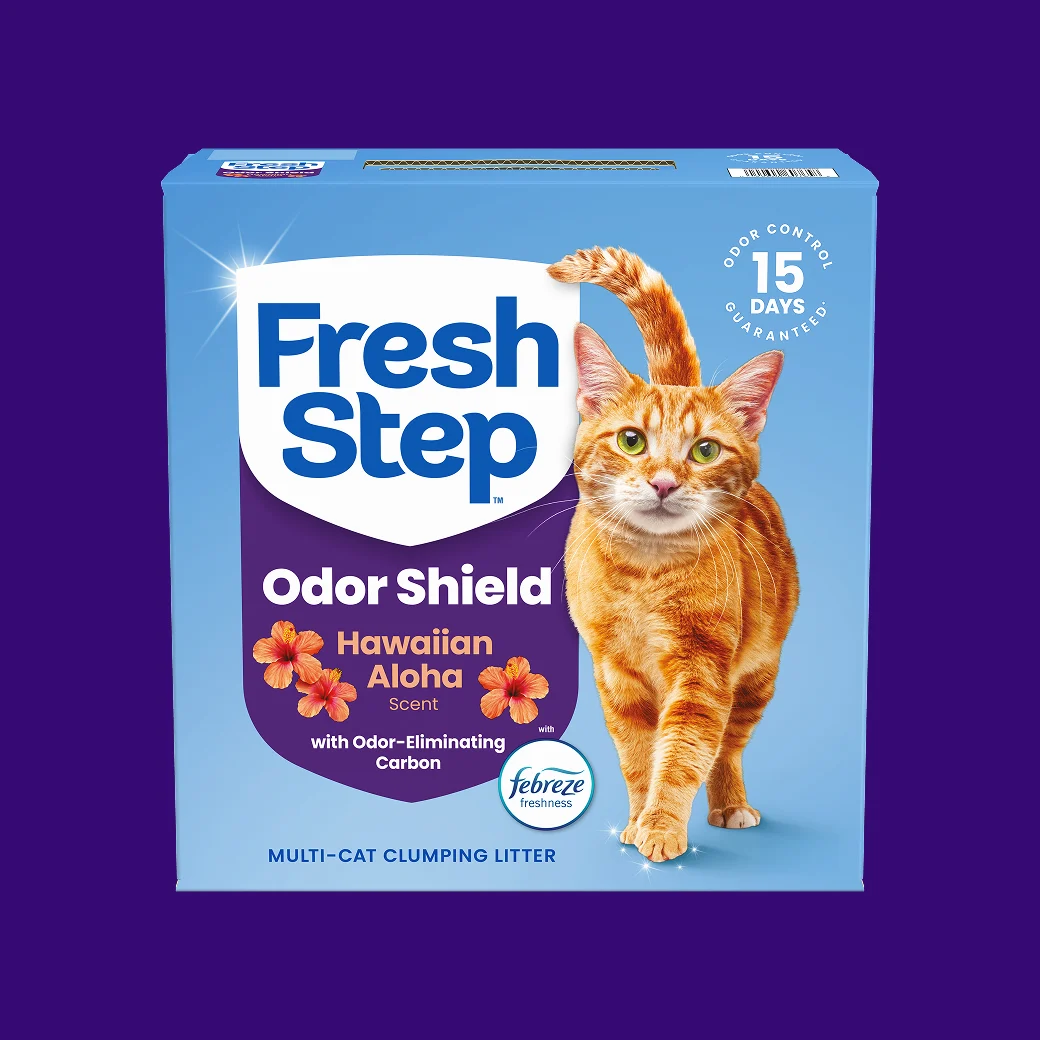 A carton of Fresh Step Odor Shield with Hawaiian Aloha scent on a purple background