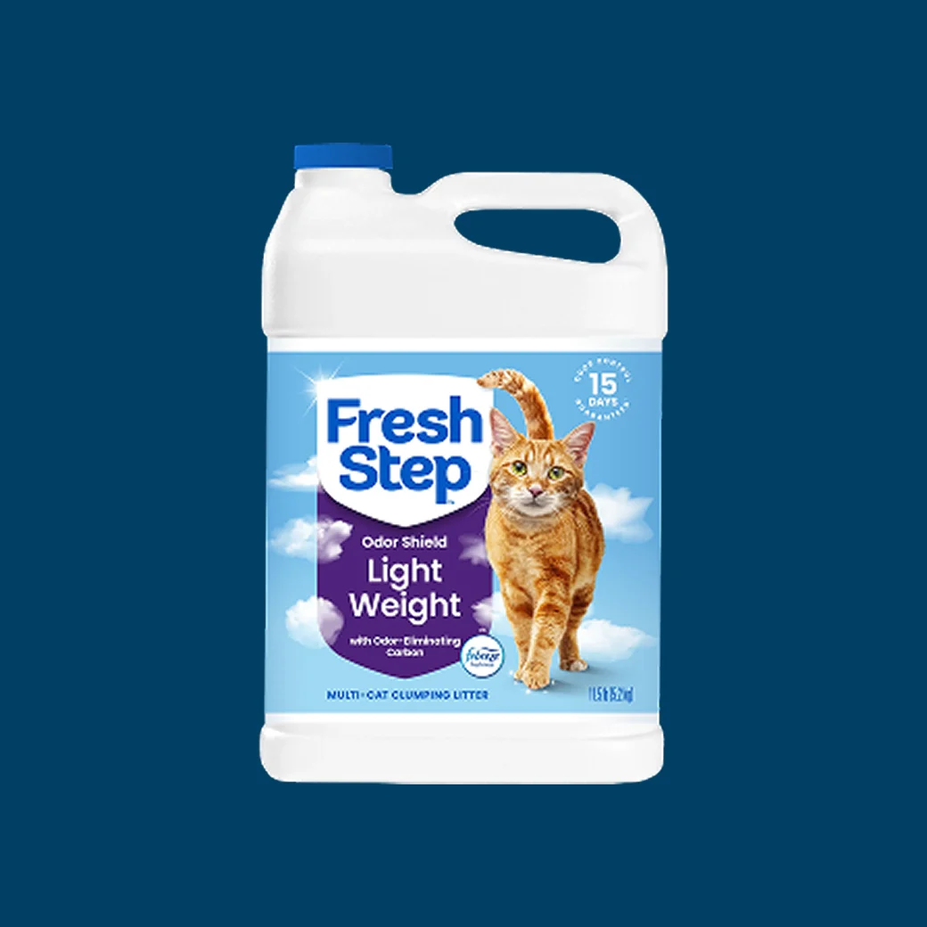 A jug of Fresh Step Light Weight Multi-Cat litter on a blue background