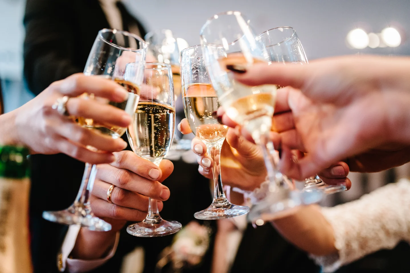 people-celebrating-a-happy-event-clinking-glasses-of-champagnehands-picture-id1061681850