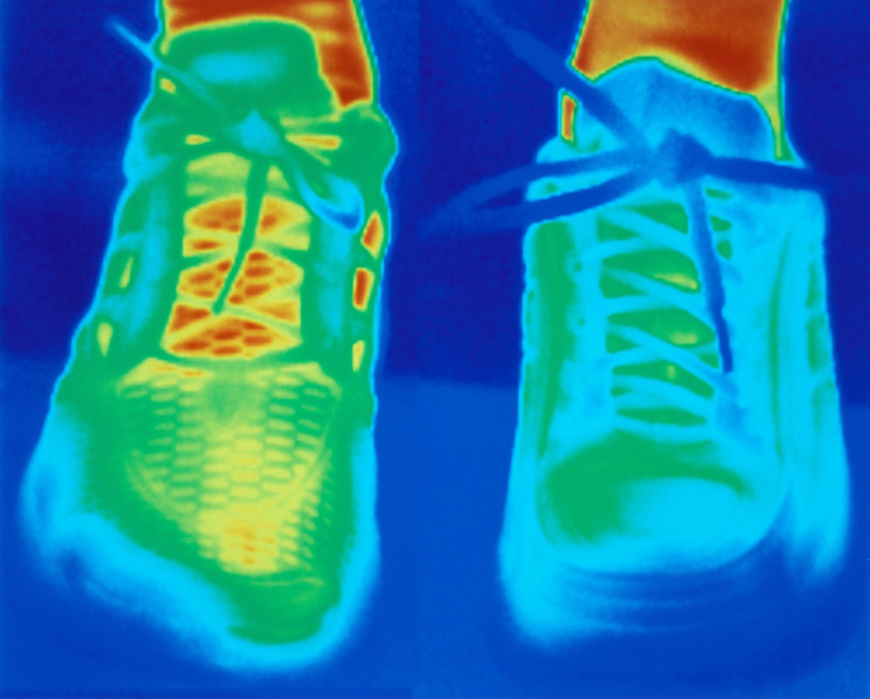 Scientists use ingredients called "chemicals" to develop new, smart materials and fabrics. This picture shows a thermogram of sports shoes. A lot of red is good, showing that heat is escaping from the shoe, keeping the athlete cool. Then it goes through yellow and green to blue, where the heat is trapped. Which shoe is the most efficient?