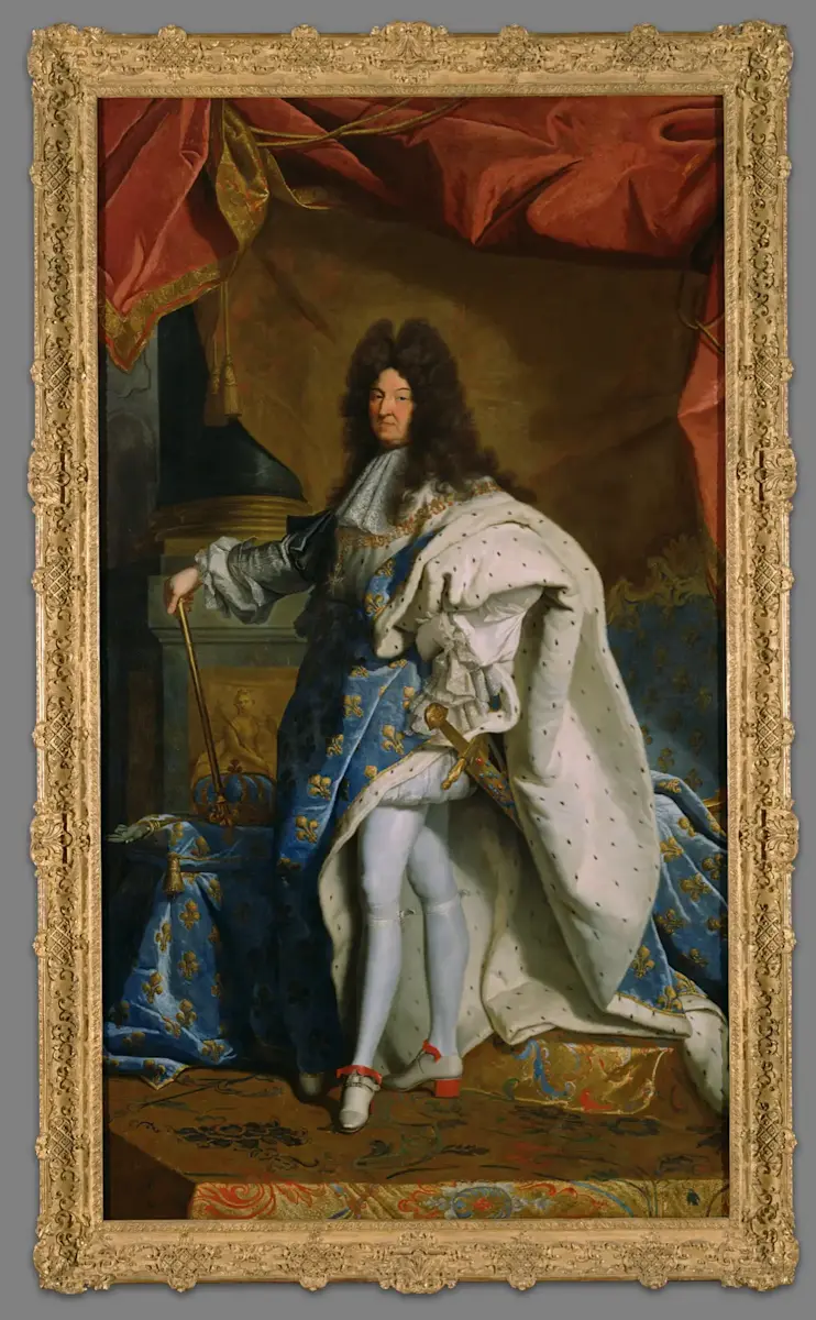 Hast du schon mal von König Ludwig XIV. gehört? Er war ein französischer König, der für den Bau des Schlosses von Versailles und seinen einzigartigen Stil berühmt wurde. Während andere Könige und Königinnen Mode nutzten, um ihre Macht zu zeigen, ging König Ludwig noch einen Schritt weiter. Er hat sich nicht an eine Kleiderordnung gehalten, sondern seine eigene geschaffen! Er veränderte die Kleidung aller Personen an seinem Hof nach seinem eigenen Modegeschmack.