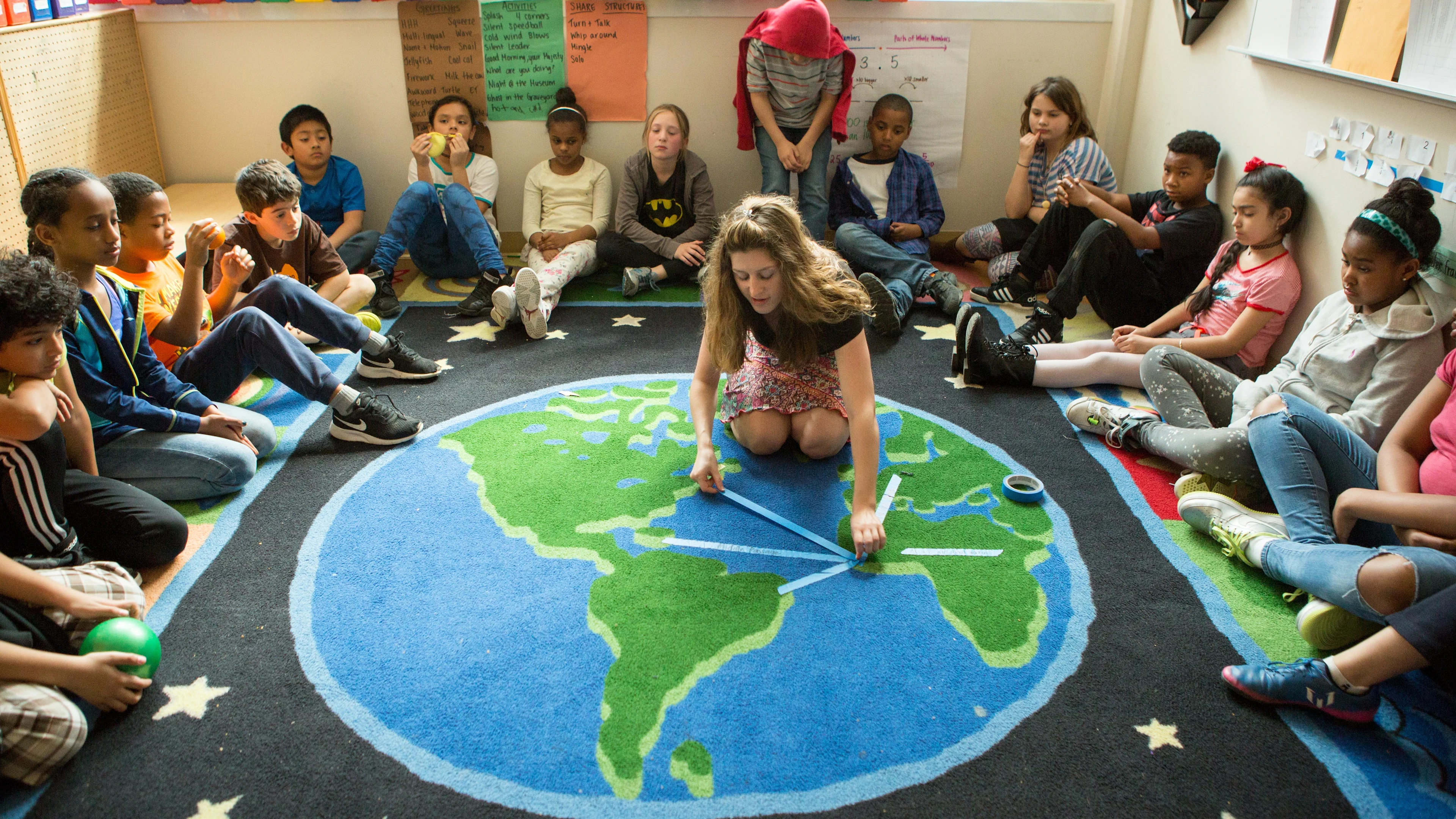 In this classroom, students follow the same lesson at the same time, and the teacher talks to the whole class at once. But the lesson might not work equally well for everyone. Some kids look interested, others bored. In your last lesson, which kid were you? Did you want to go slower or faster, or learn in a different way?