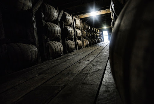 whiskey barrels lined up