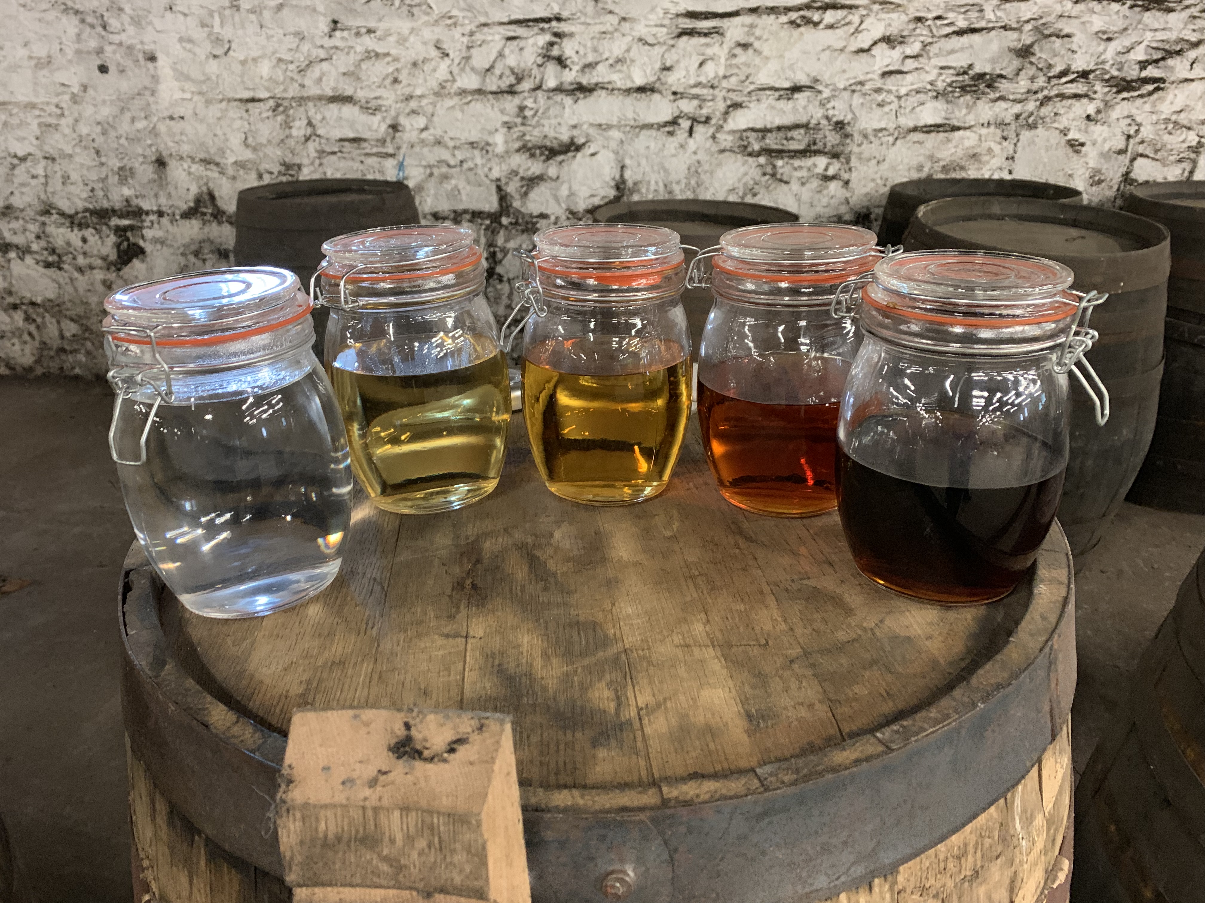 jars of different colored liquids