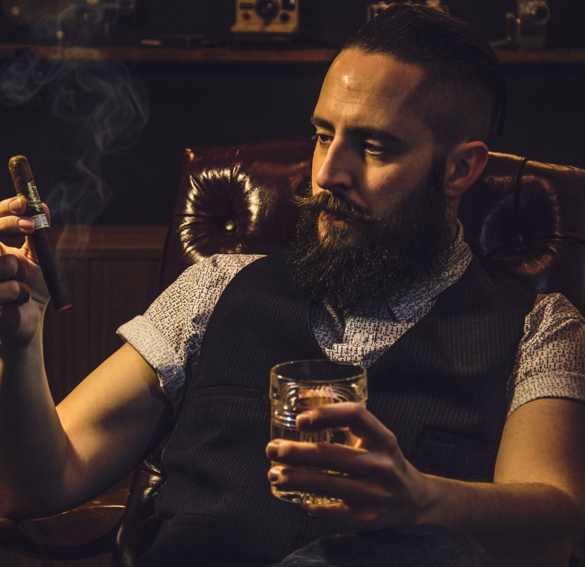 Man with whiskey and cigar