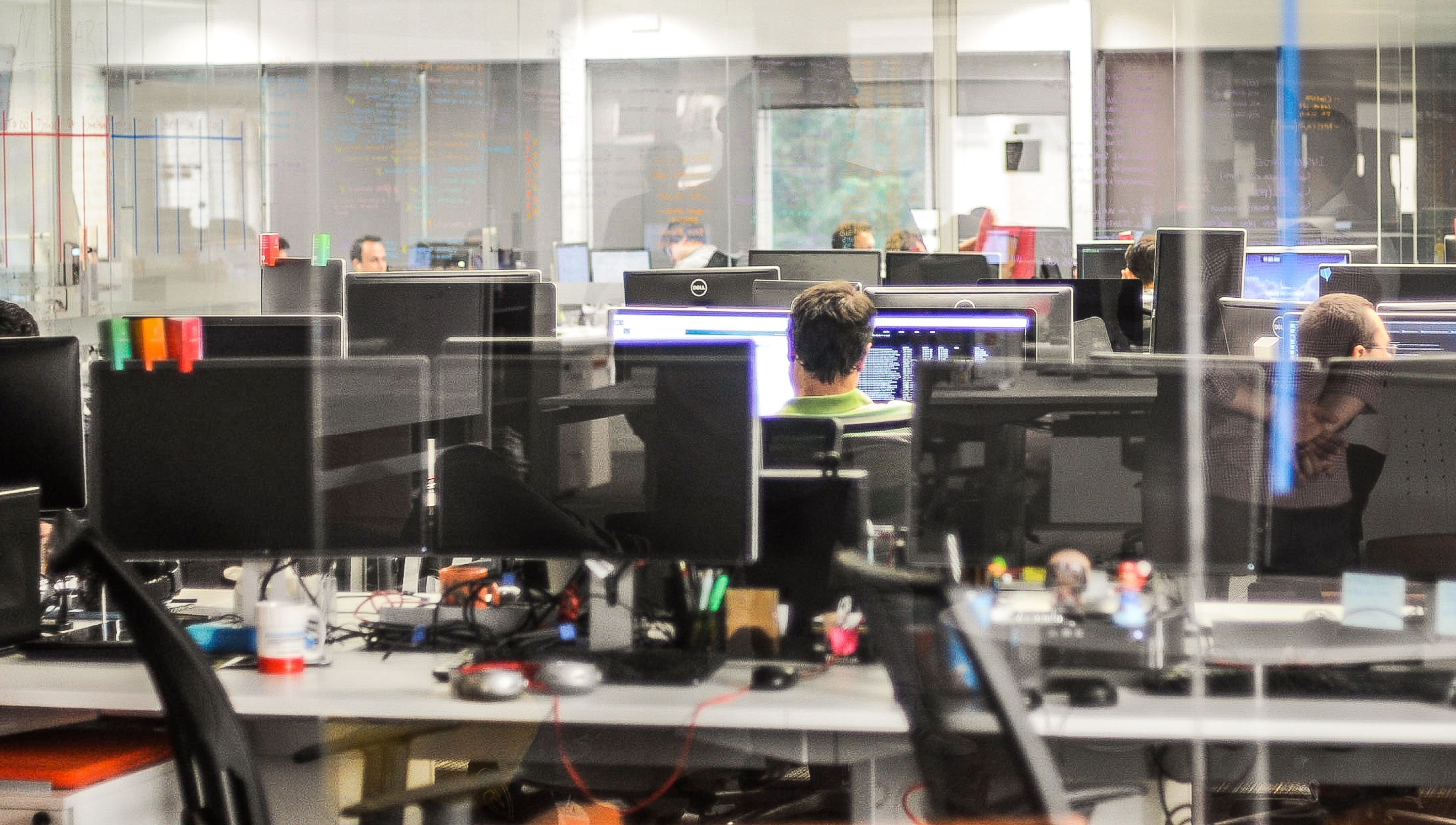 Photo of monitors and desks