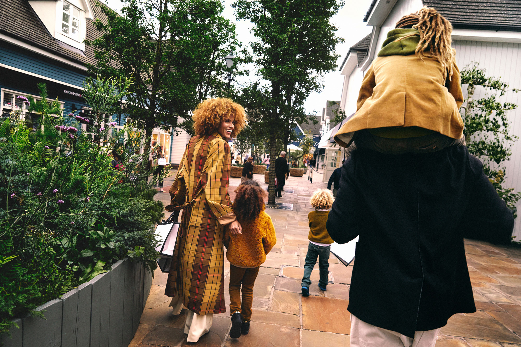 A family shopping at Bicester Village