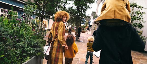 A family shopping at Bicester Village