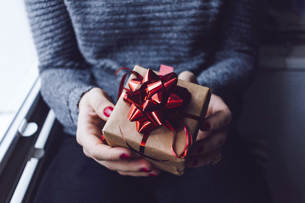 Someone holding a gift