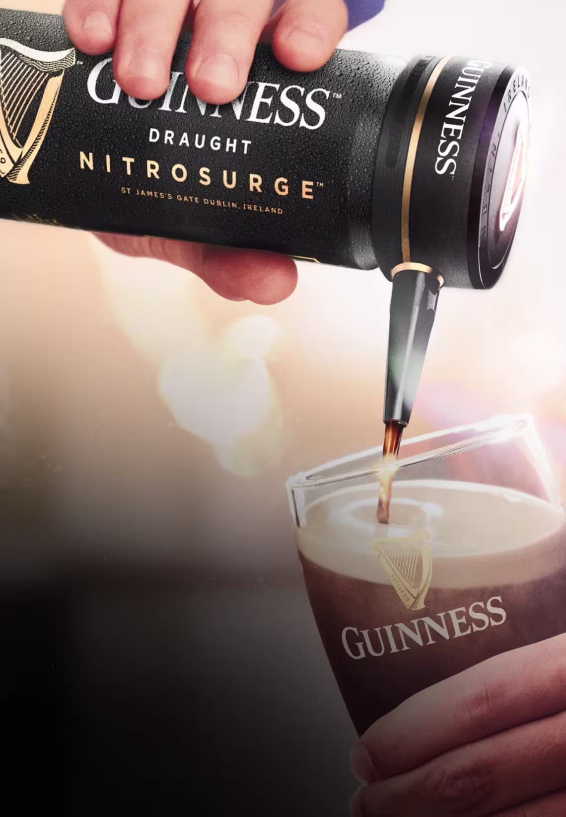 Can of Guinness Nitrosurge being poured into a pint glass