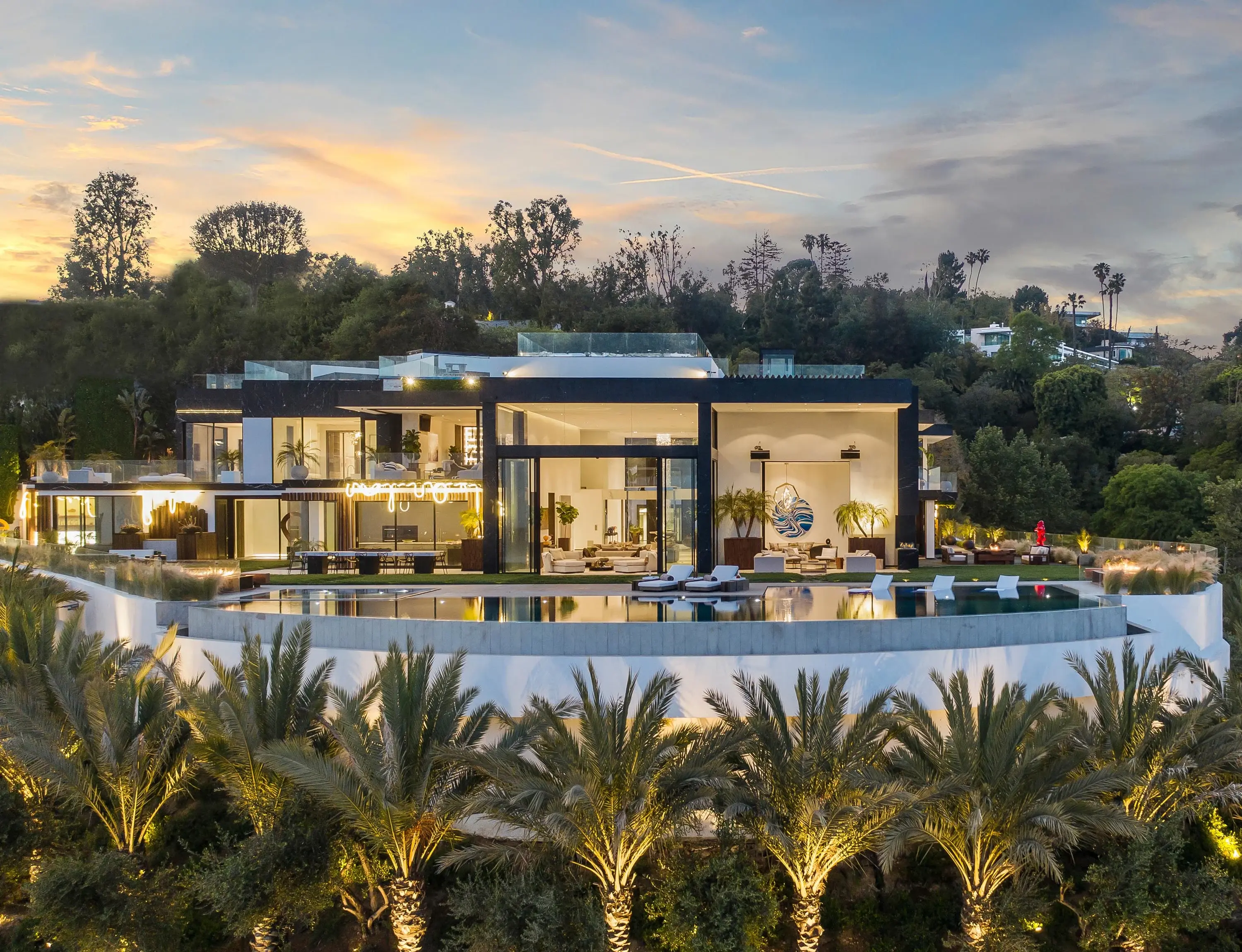Hero image for The exclusive mansion, represented by acclaimed agents Aaron Kirman and Mauricio Umansky, will sell to the highest bidder on May 9.