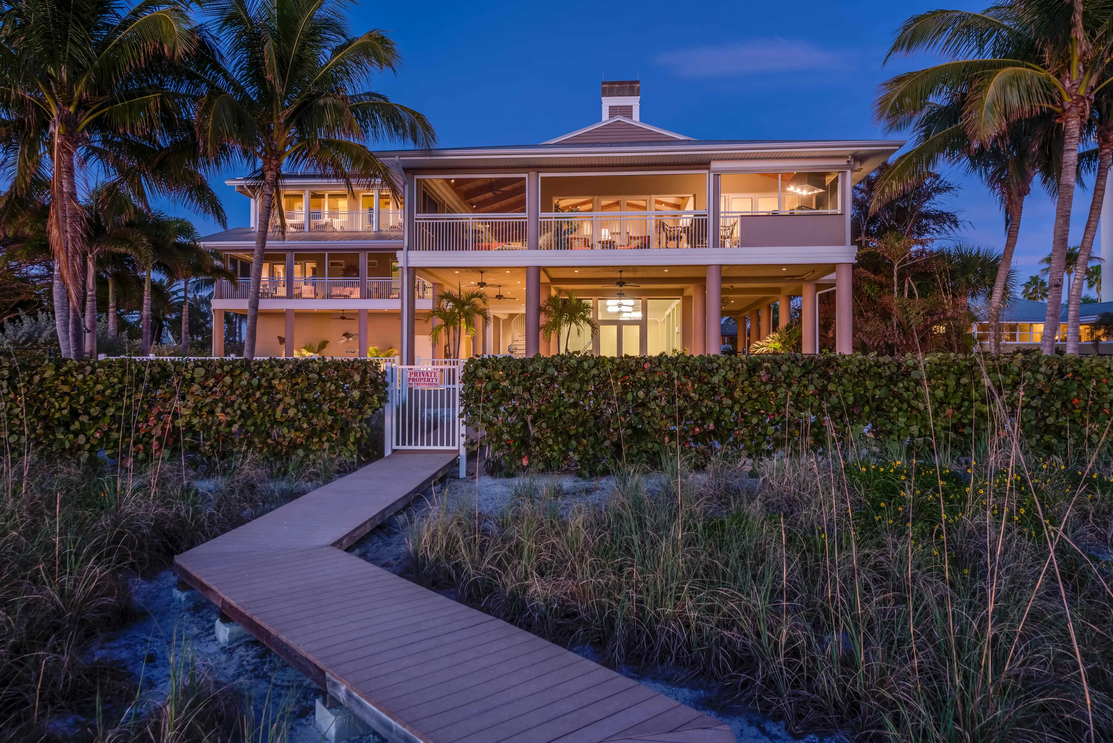 Panoramic Gulf views and spectacular sunsets are only part of the charm of 7840 Estero Blvd. Three-levels of outdoor living and a private boardwalk await you at your gated beachfront estate. Melt into a coastal state of mind as you enjoy the amenities of 