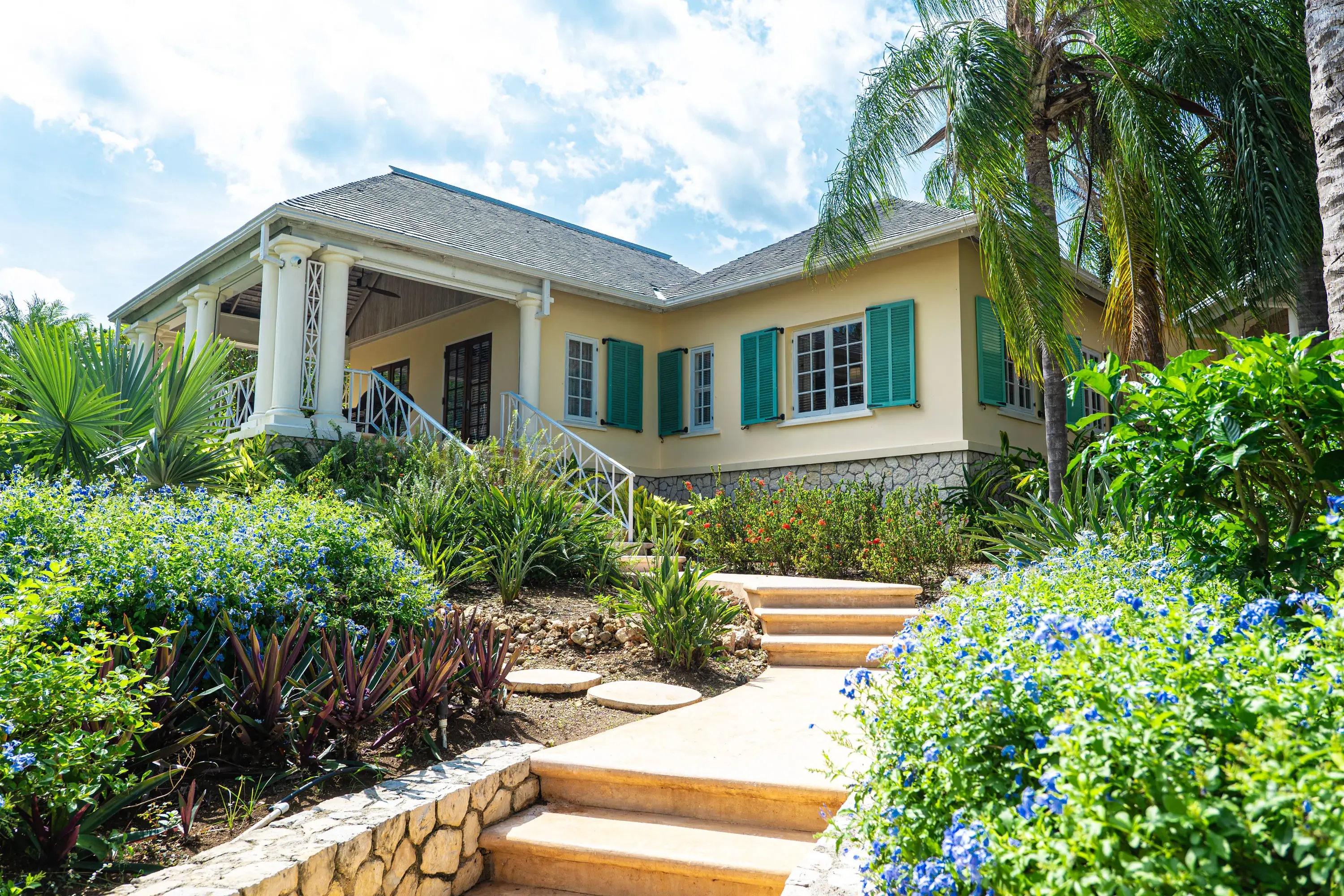 Kenyan Sunset offers a distinct fusion of Caribbean elegance and African inspiration across two majestic acres in prestigious Caribbean Heights. 
