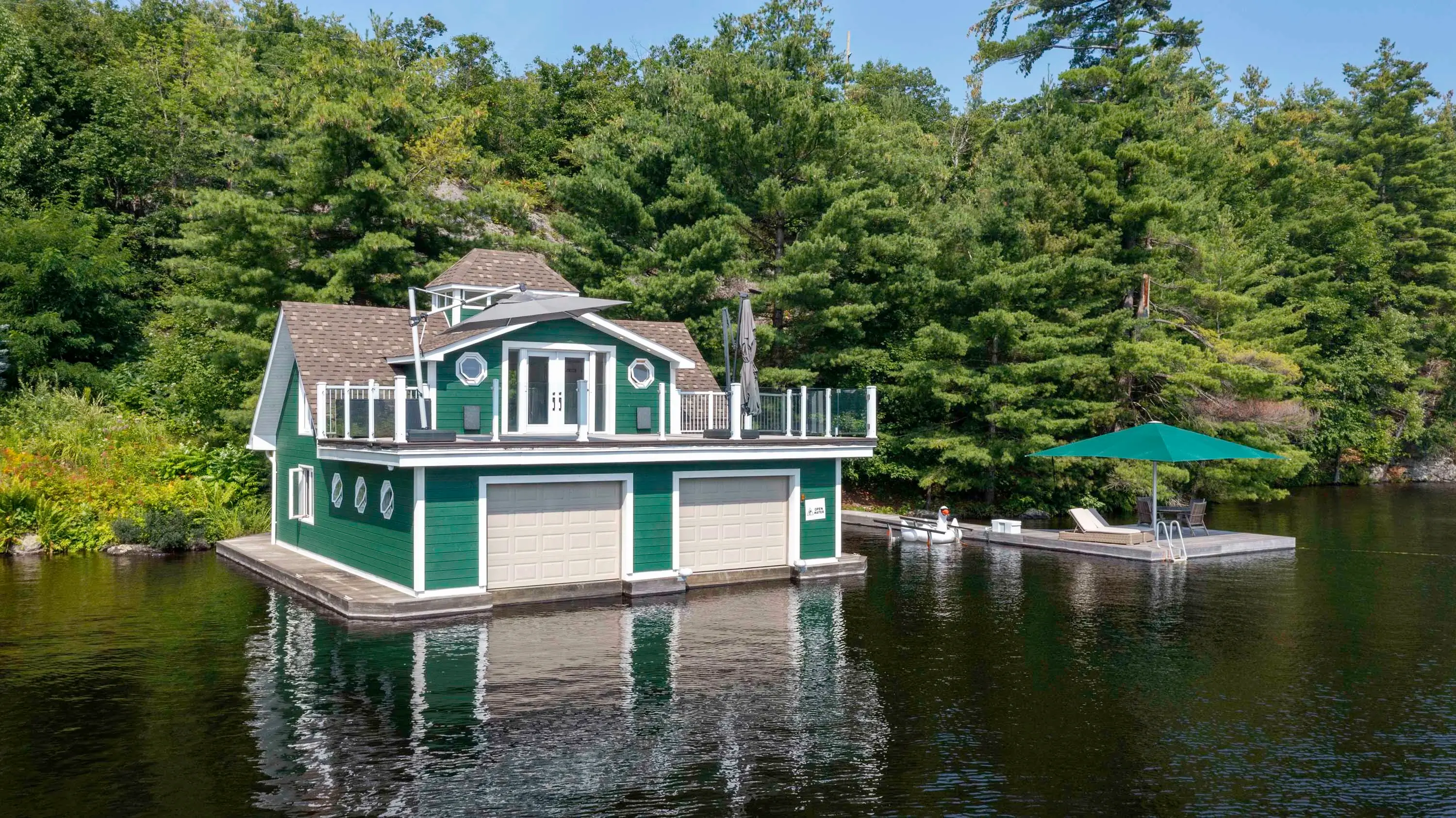 Welcome to the Ultimate Year-Round Muskoka Retreat. Situated on a generous 8.3-acre lot with 332 of coveted southwest exposure shoreline, this stunning lakehouse estate offers both European luxury and Muskoka charm. The three-story main Lakehouse alone fe