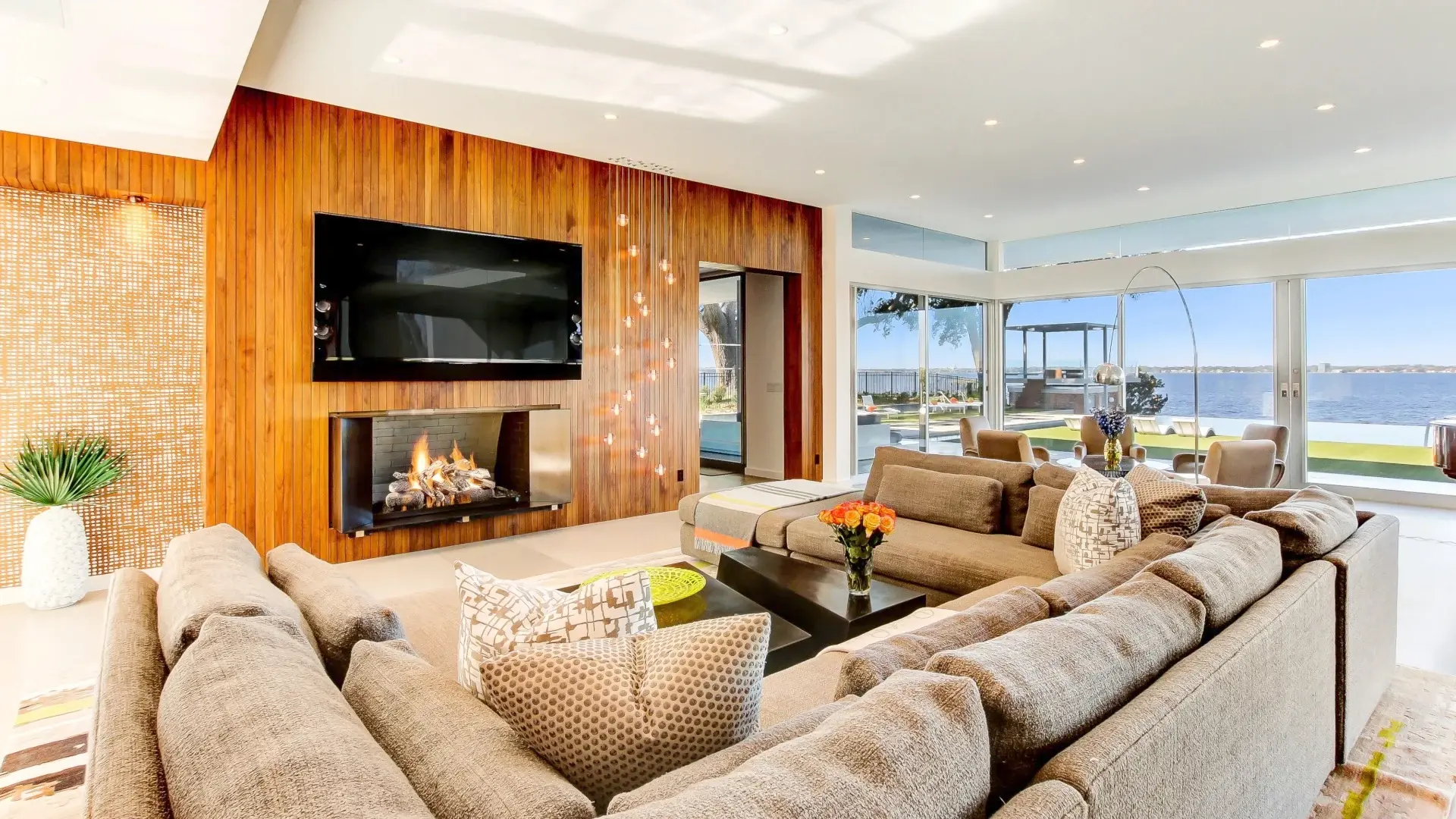 Welcome home to 3940 Alhambra Drive West, a resort-style estate originally built in 1956, and architecturally restored over three renovations between 2005 and 2016, with every amenity under the Florida sun. This mid-century modern abode boasts an indoor-o