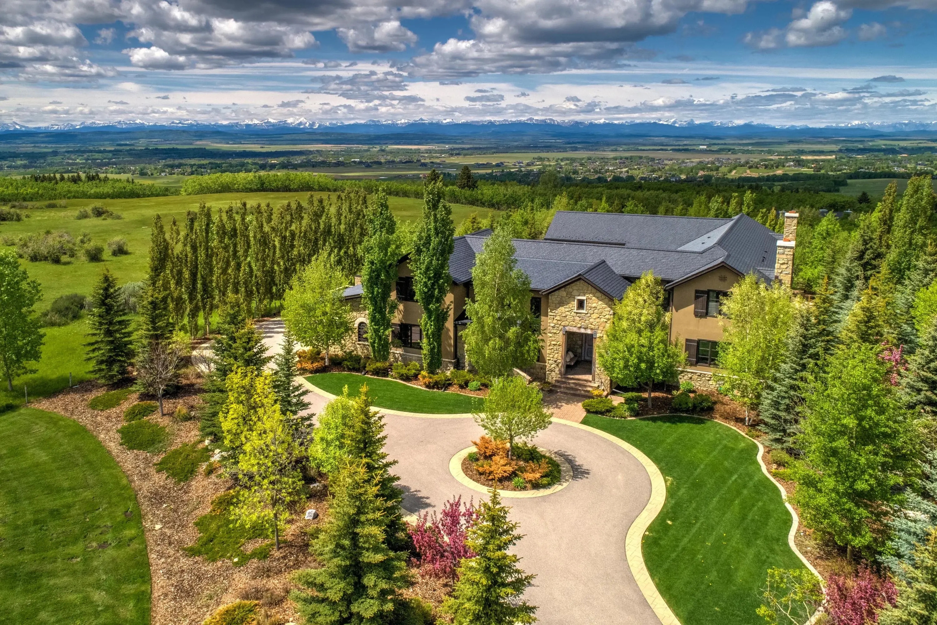 Featured in National Post, Best Home Alberta, and as a set for an award-winning mini-series, this custom-built estate offers old-world artistry and luxurious finishes.