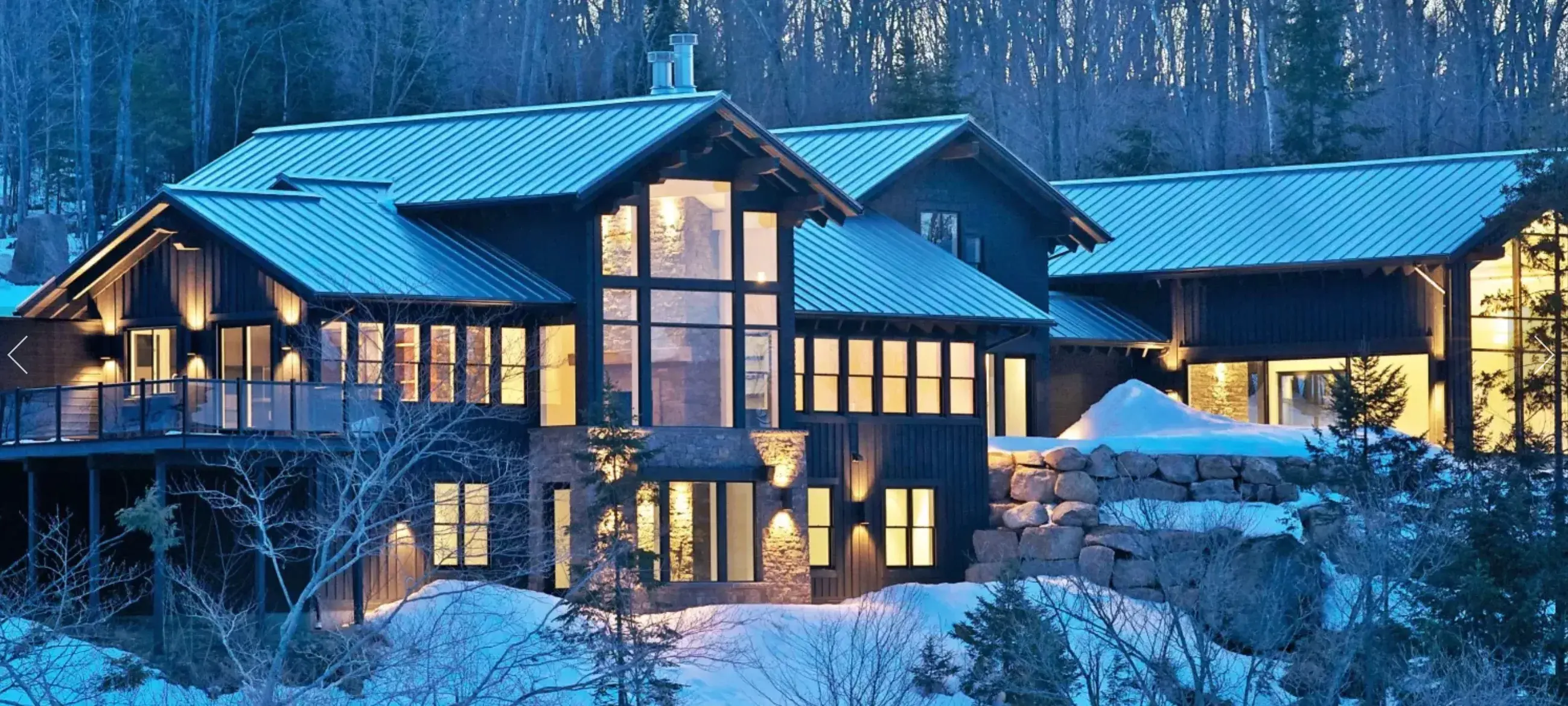 Come home to a contemporary mountain escape. A modern aesthetic inspired by a blend of materials welcomes you inside Rugged House, while walls of windows beautifully frame views from every corner of the sun-drenched interior. Get an early start with a sun