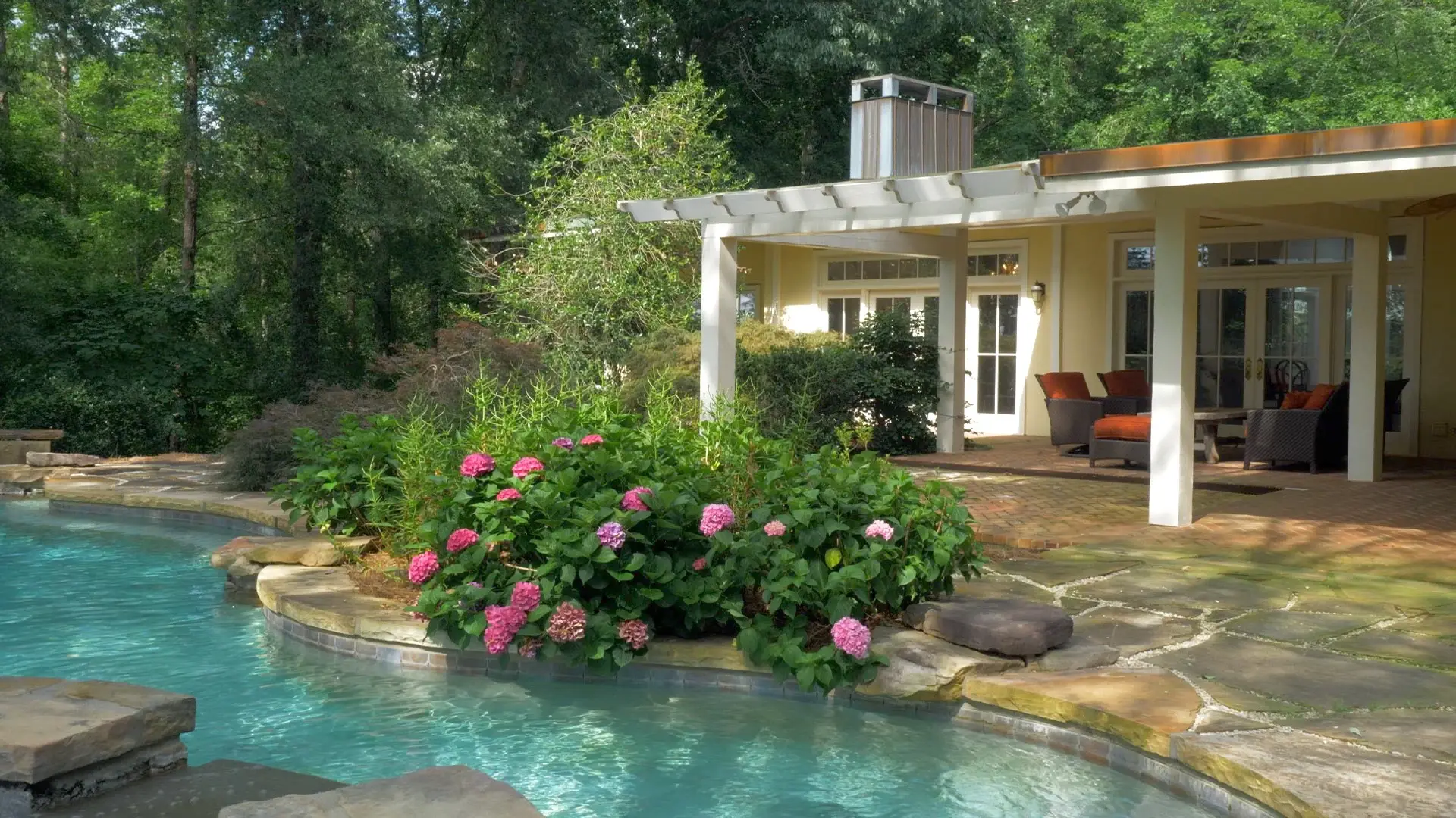 A bucolic country setting and stunning views from high above the Yadkin River await you on Thunderwood Farm Lane. Luxurious materials and intricately crafted details blend perfectly with the sunlight streaming through the skylights and walls of glass. Hid