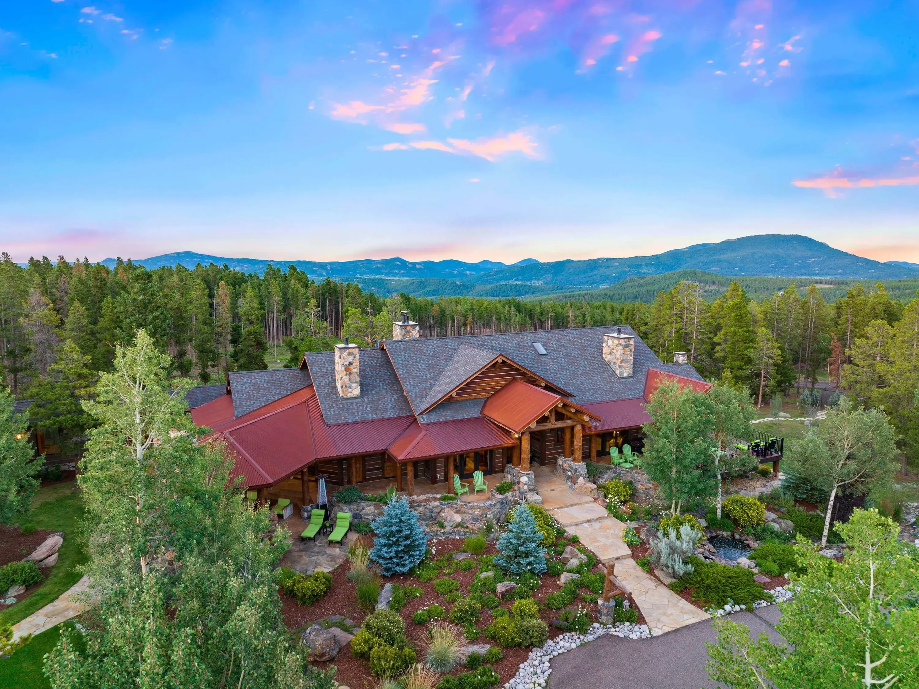 Welcome to 2nd Chance Ranch, a breathtaking estate where luxury meets the serenity  of nature with easy access to both Denver and Evergreen. Nestled on two parcels encompassing nearly 50 acres, of park-like land, this remarkable property features a primar