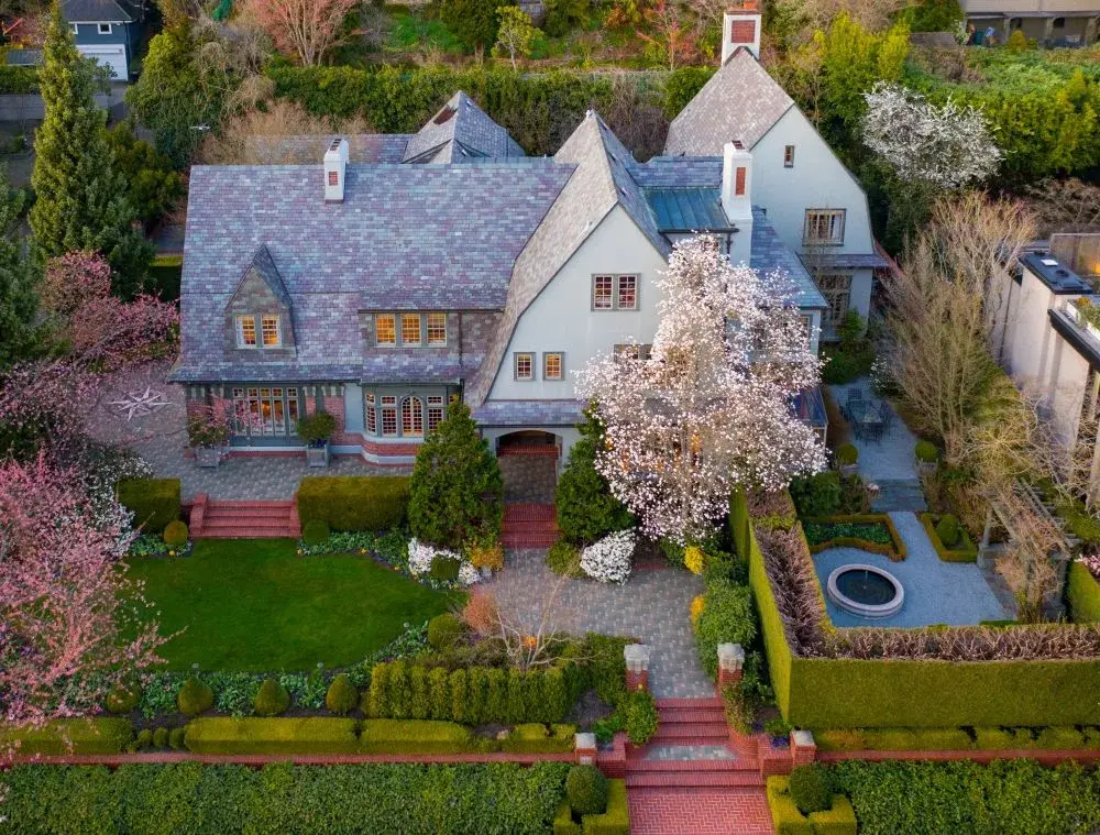Located in prestigious Queen Anne, this historical estate is filled with incredible entertaining spaces and a stunning kitchen with easy access to an outdoor oasis. 