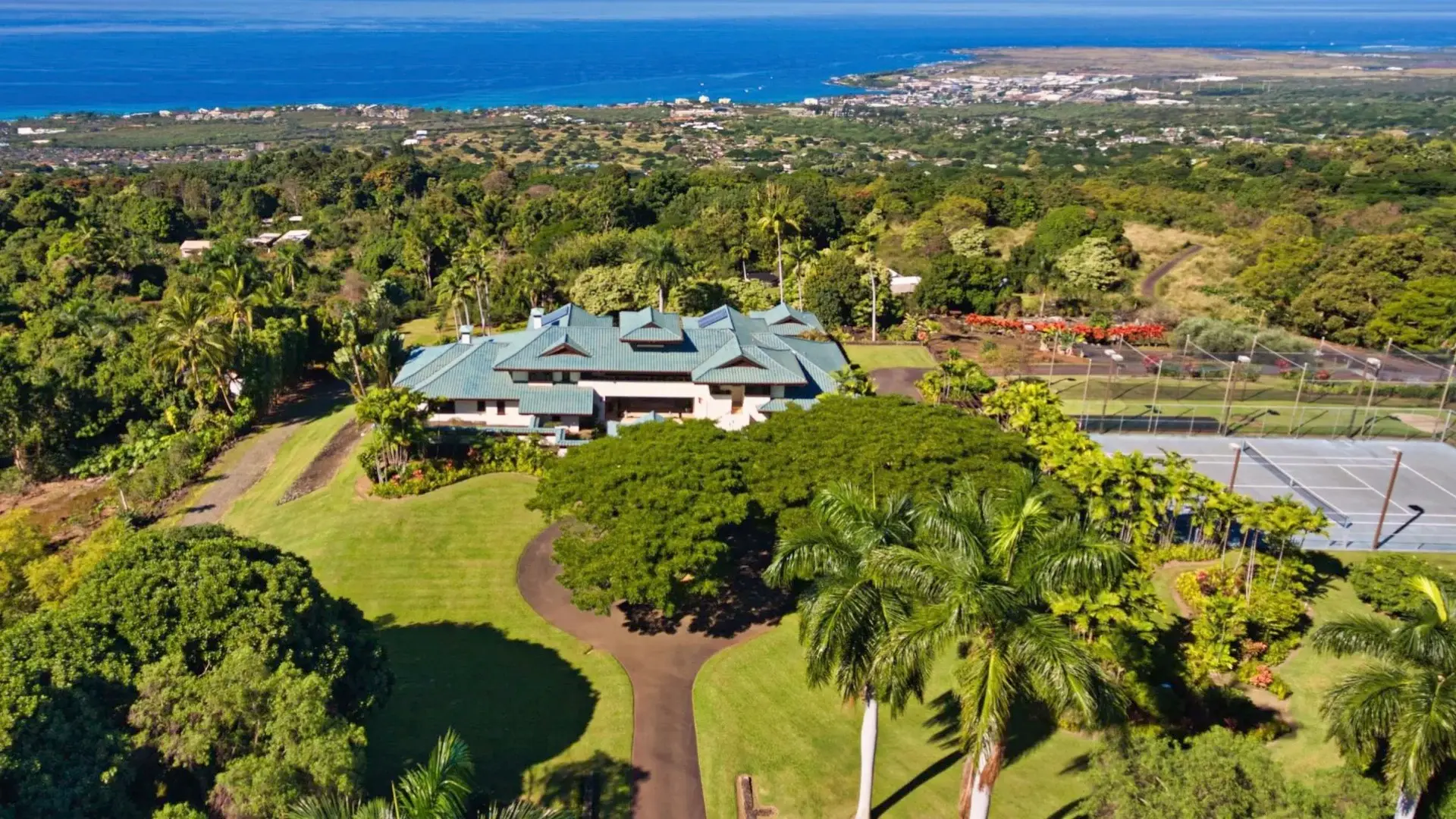 This incredible estate sits on the western slopes of Hualalai Mountain, with expansive views of the Kona coastline.