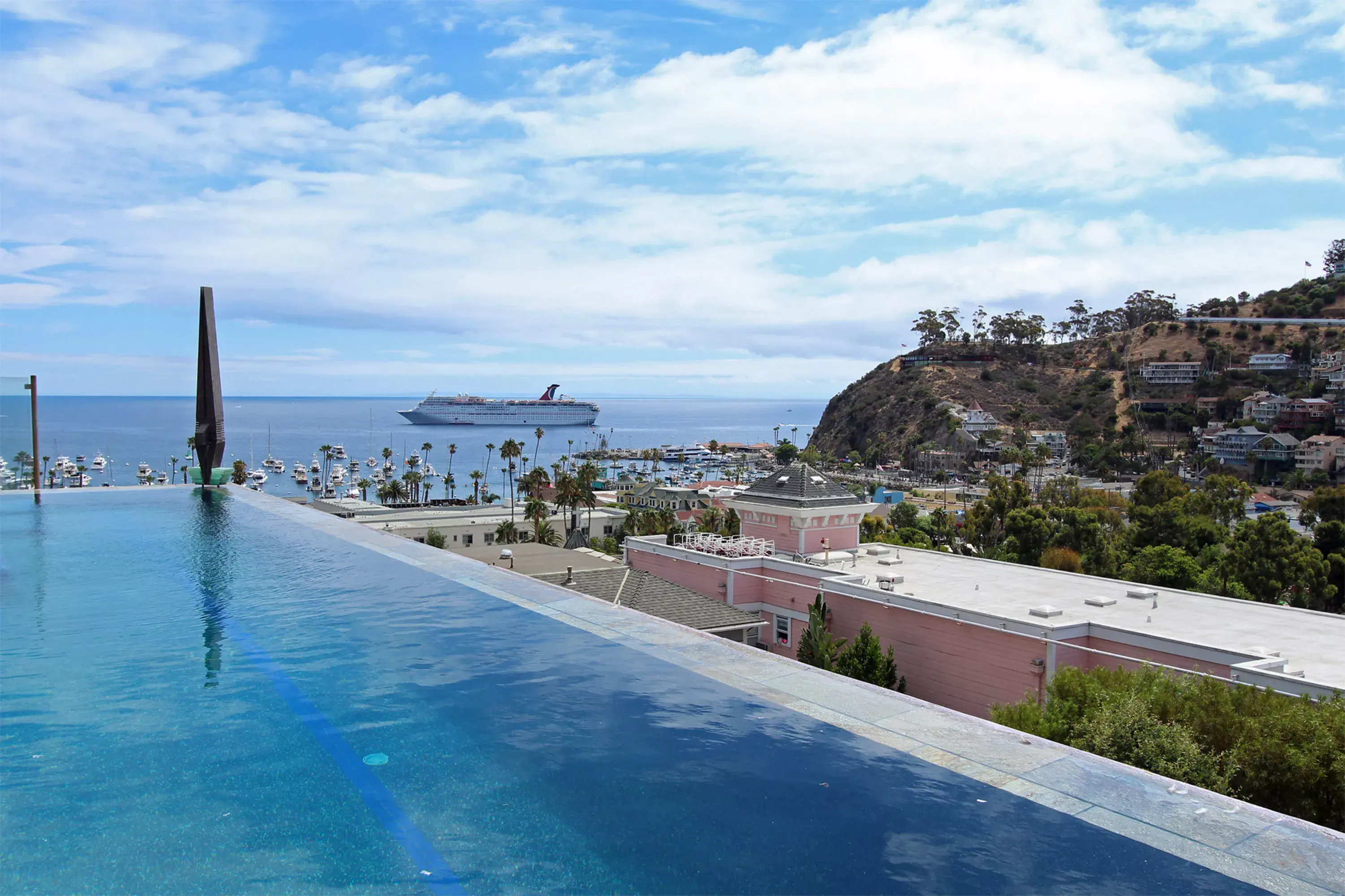 Perched hillside off a winding drive with panoramic views of Avalon Bay and the Pacific Ocean, gated 223 Beacon Street boasts over 6,800sf of privacy and supreme indoor/outdoor living. Located just 22 miles southwest of Los Angeles, enjoy prime boating an