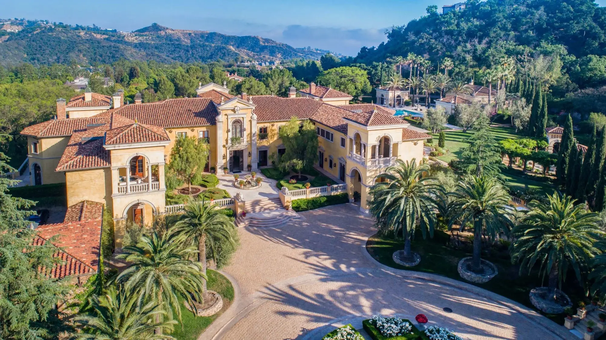An impossible to recreate estate across 9 acres in exclusive, guard-gated North Beverly Park boasts resort-style amenities over 20,000±sf. 