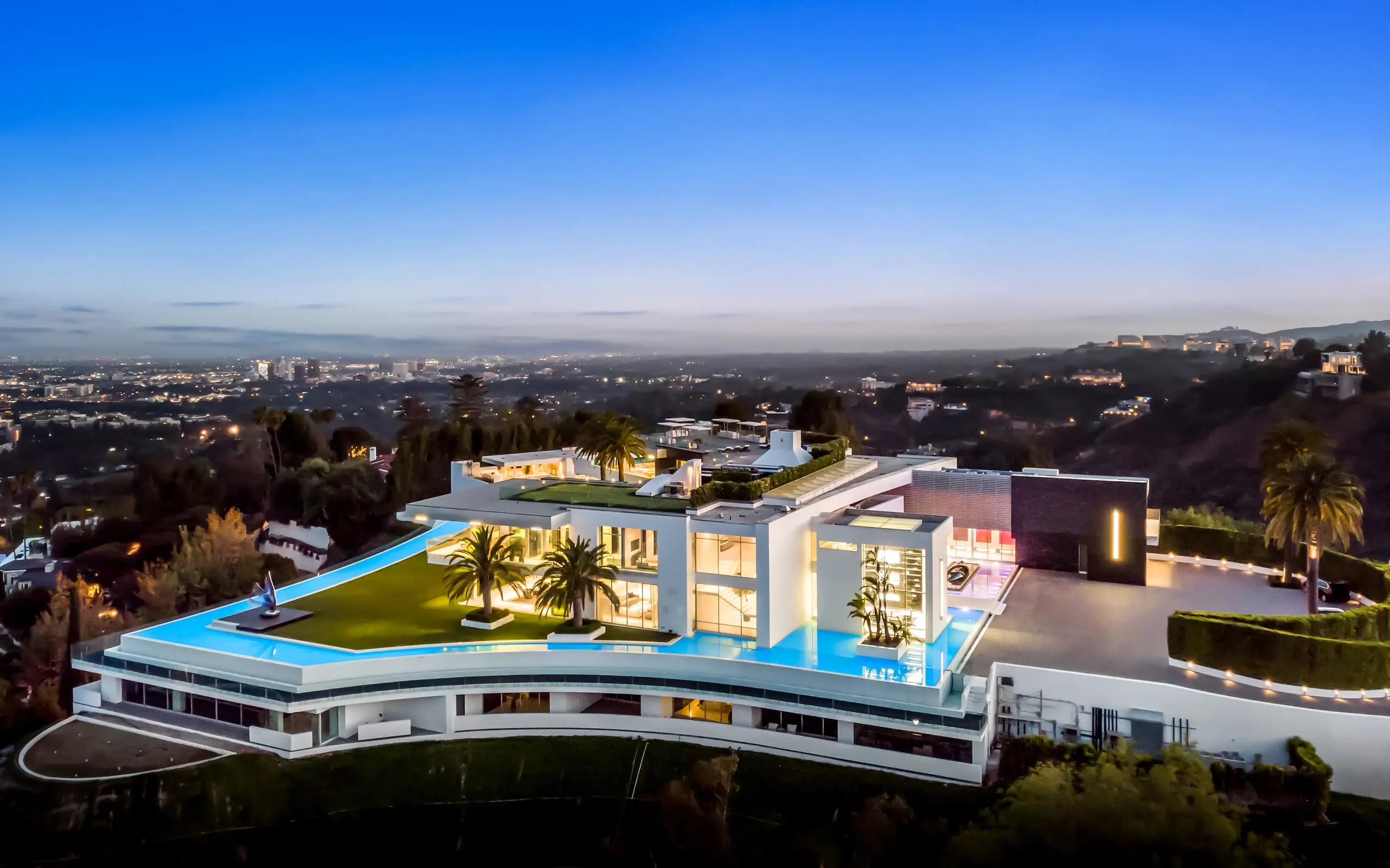 Hero image for The 105,000sf Bel Air estate, represented by agents Aaron Kirman, Branden Williams, and Rayni Williams, will be auctioned in February.