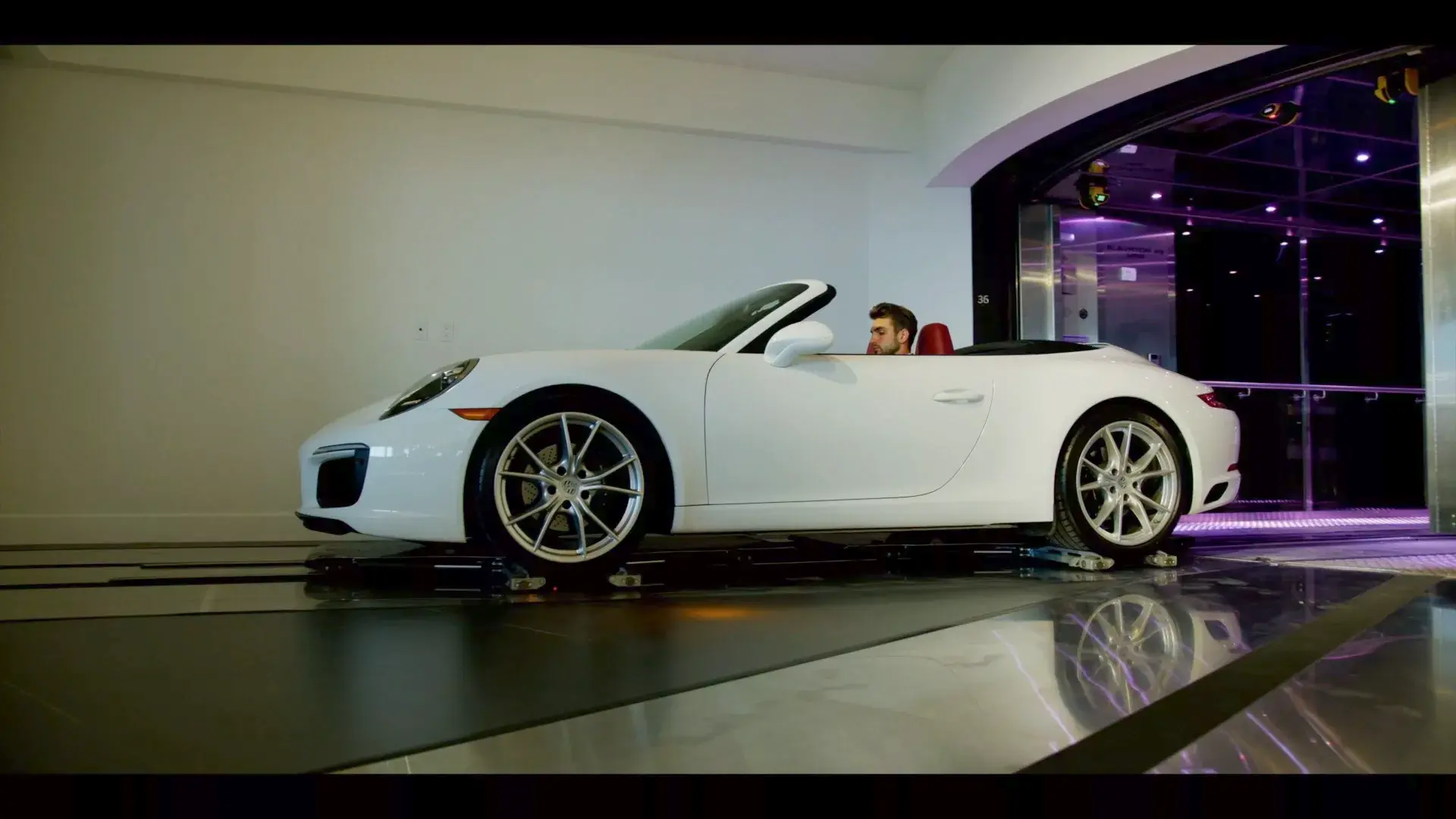 Come home to your 36th floor private escape—without ever leaving your car—in the Porsche Design Tower, a high-rise tower unlike any other. Enter the incredible lobby where a glass elevator is waiting to whisk you, and your car, up to your private garage a