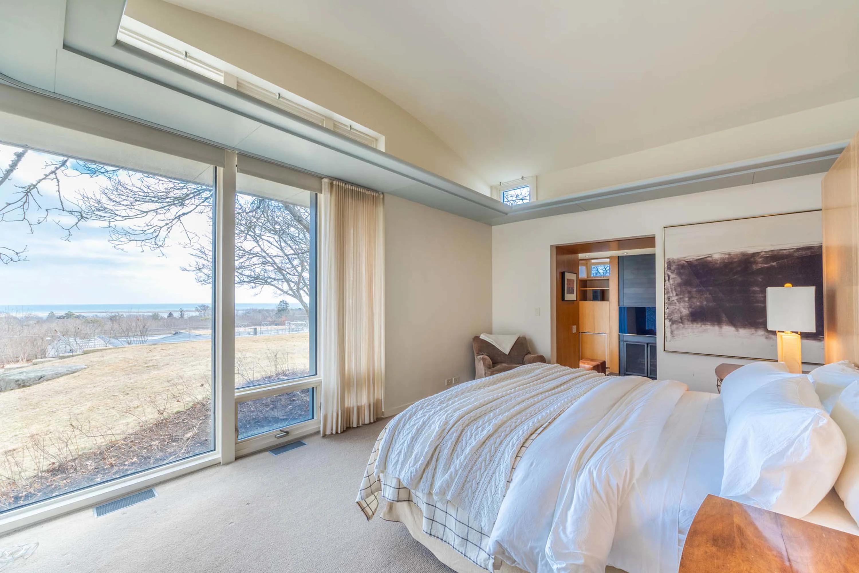 Chilmark House | 8 Snail Road, Chilmark, Martha's Vineyard, Massachusetts 02535 - 24_-_Primary_bedroom_view_iao9xx