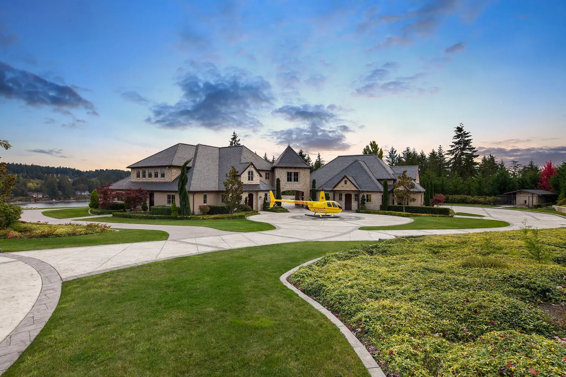 Located just one hour from Seattle, this gorgeous waterfront property on Wollochet Bay is the perfect compound for any outdoor enthusiast. Set sail from the shores of your 450 feet of waterfront with deep water moorage in a yacht, or take to the skies fro