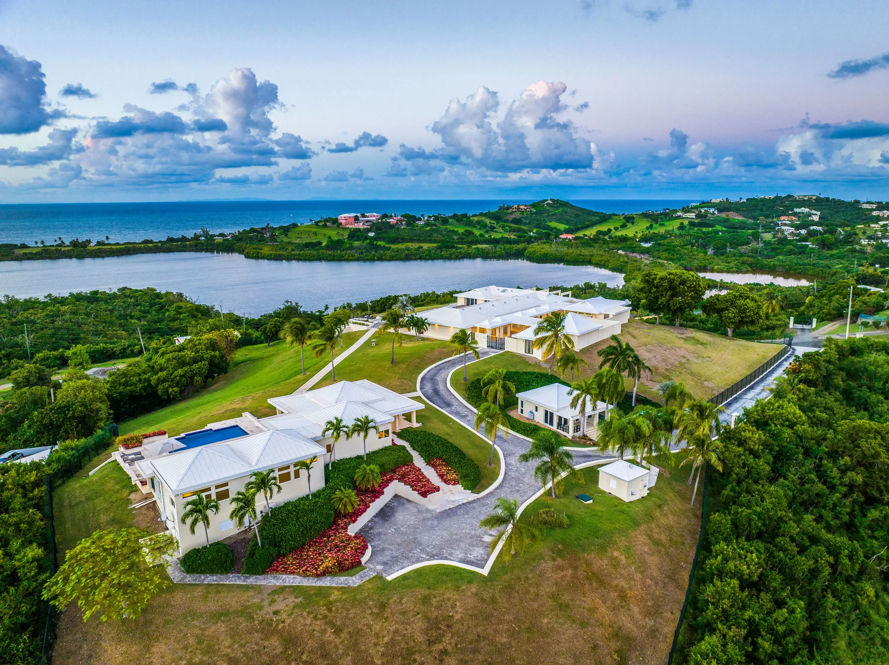 3 houses, 2 pools, & endless entertainment areas are just the start to the amenities at this vast estate on nearly 8 acres, complete with views of the Caribbean Sea to St. Thomas.