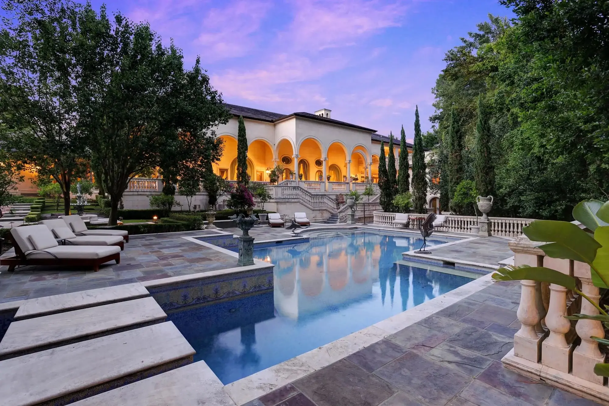 Located in Houston's prestigious Stablewood community, this estate features master craftsmanship and grand scale entertaining spaces.