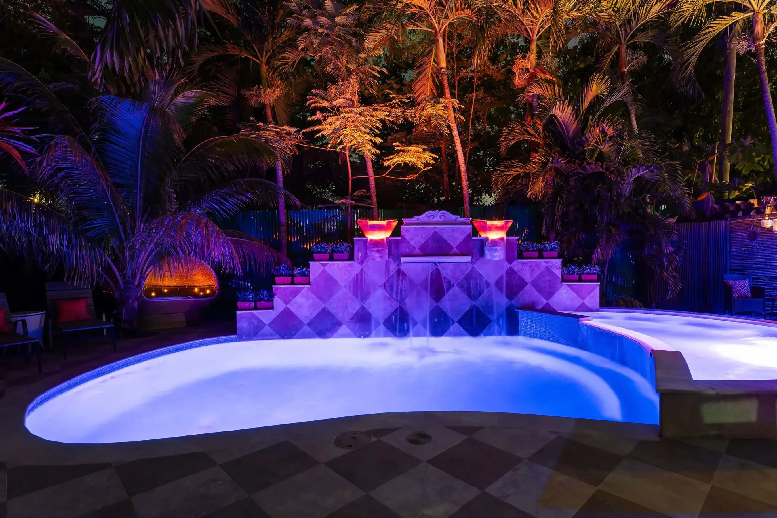 A bespoke, fully furnished Caribbean estate offers an extraordinary opportunity along Rincón’s famed “Road to Happiness,” where complete privacy meets elevated resort-style living. Artistically designed with custom natural stone and wood finishes, this on