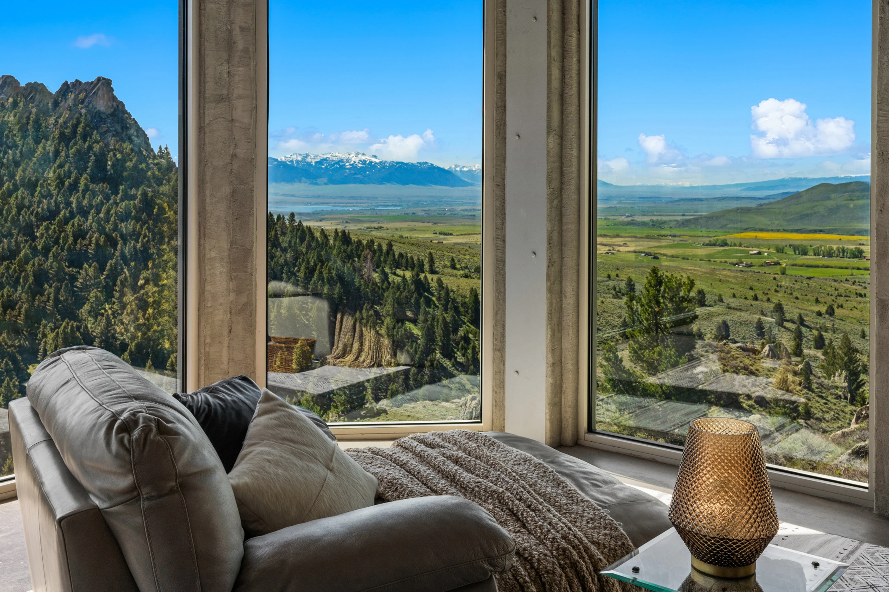 Masterfully engineered mountain retreat near Bozeman on 192 acres backing State and BLM land.
