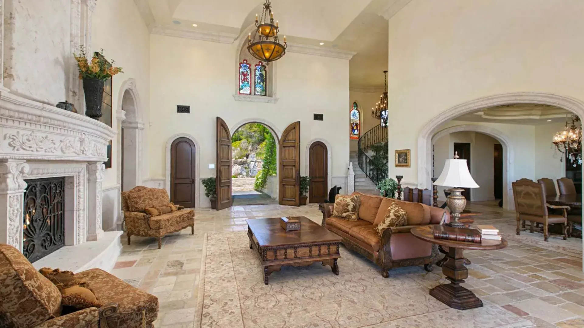 Nestled on a 4+ acre spectacular ocean view site with gorgeous manicured grounds, 18441 Via Ambiente, better known as The Castle at Cielo, lies a 12,000 sf. escape unlike anything you have ever seen. As soon as you enter the affluent guard-gated community