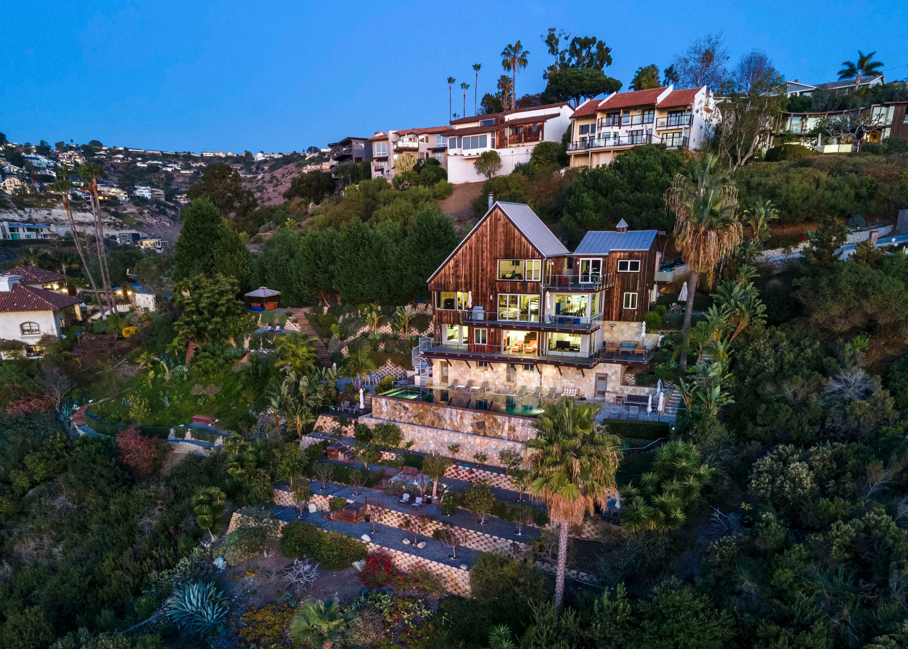 Hero image for The Barn House, a masterpiece that offers one of the most dramatic views in Laguna Beach, will auction next month via Concierge Auctions.