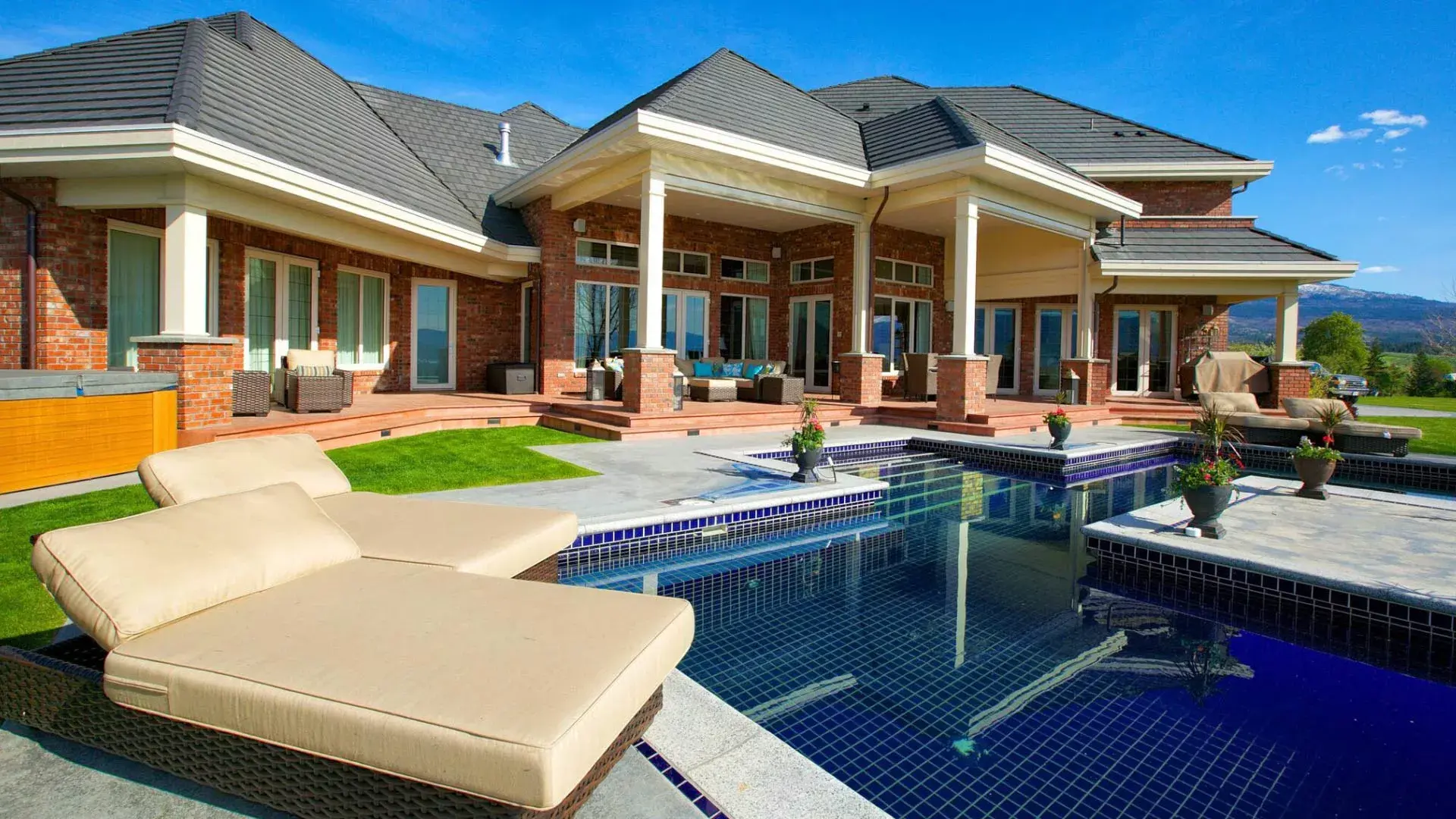 Natural beauty and modern luxury exist harmoniously side-by-side at 2830 East Kelowna Road. Beyond the stately exterior and the sun-drenched and spacious living space, the west-facing terrace beckons you to wade into the saltwater pool, witness the sunset