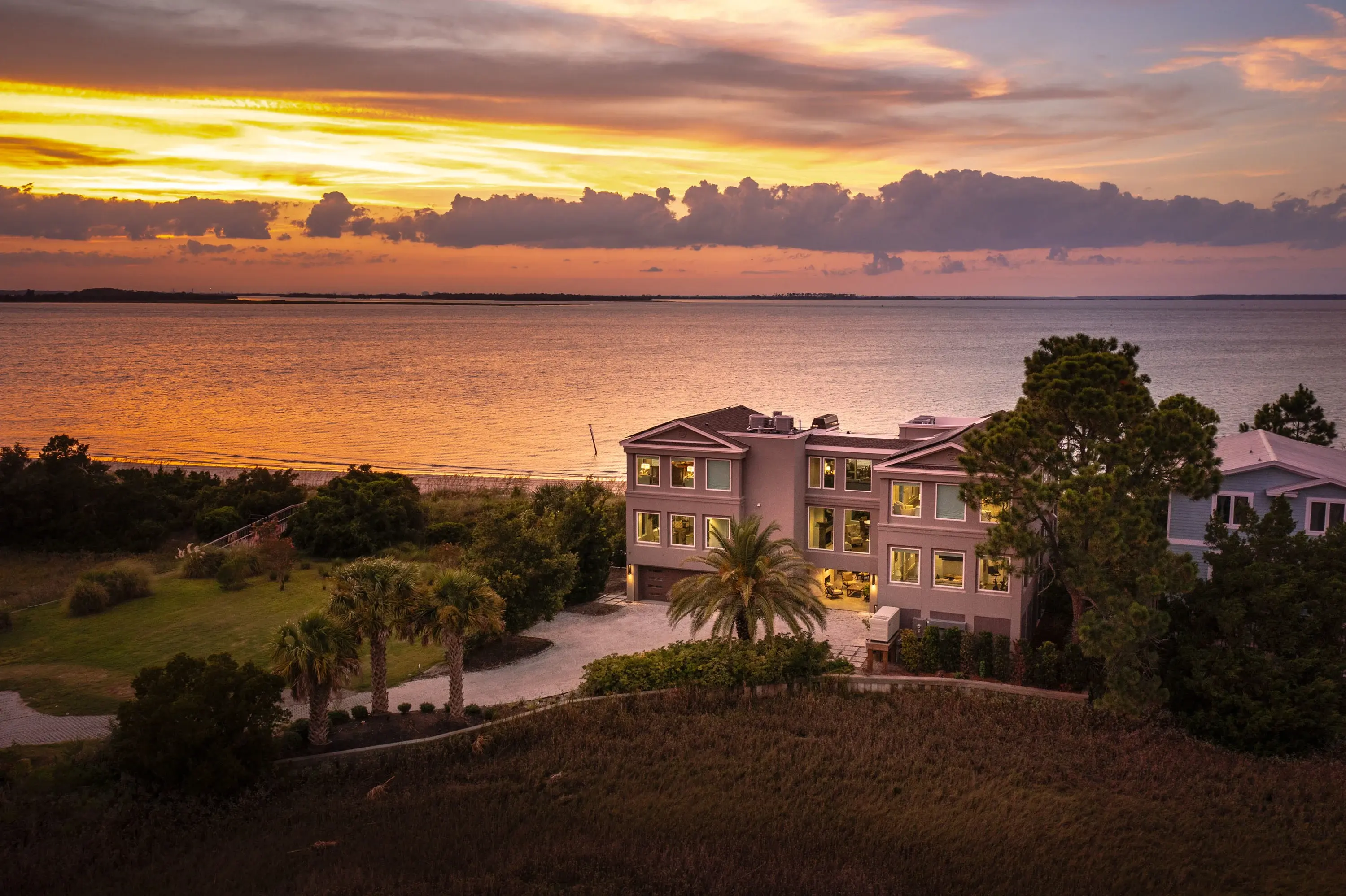 This stunning southern gem sits on over two acres of secluded beachfront. 