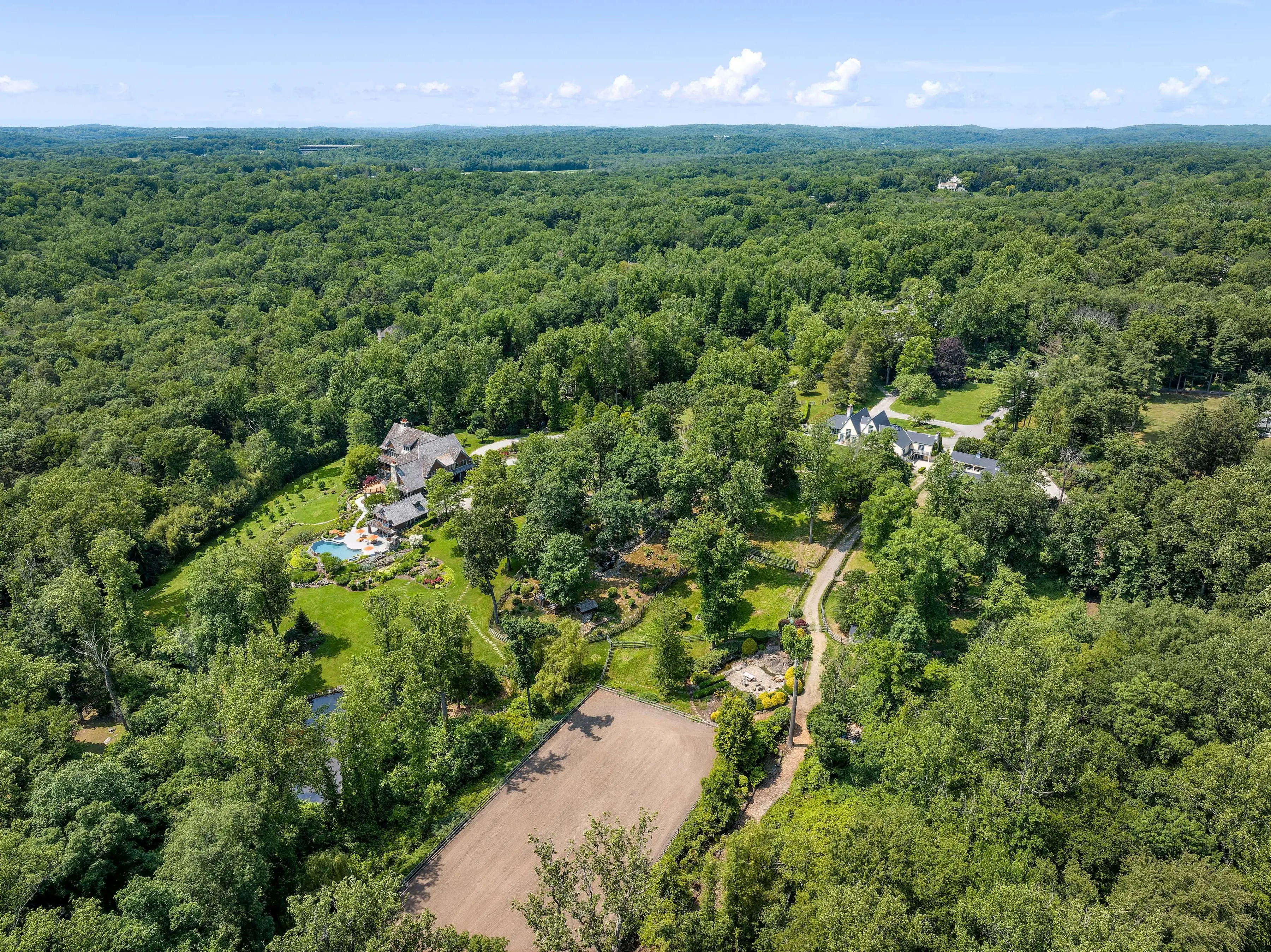 Hero image for An iconic Greenwich compound; a Tuscan Scottsdale property; a Sundance Resort home; Texas's Quail Rise Ranch; and a former Vanderbilt estate headline the month