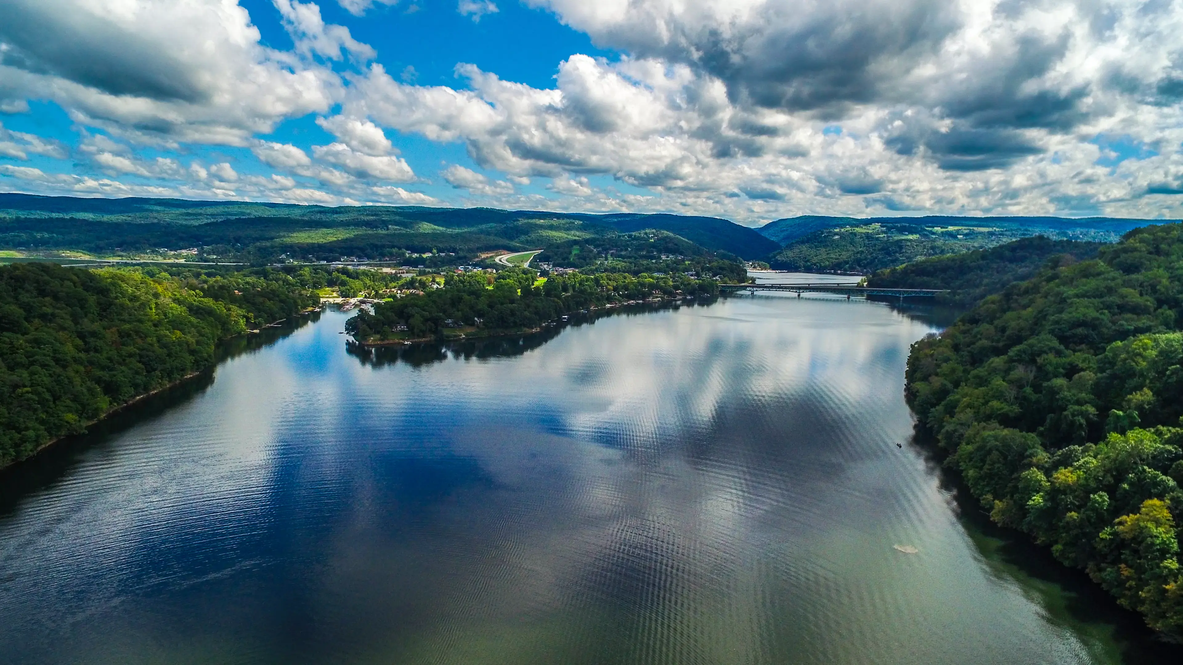 This custom-built waterfront estate offers breathtaking views of Cheat Lake, majestic mountains and private access to the water via its own boat dock with six boat slips and three jet ski docks. After a day on the water, watch the sunset from the expansiv