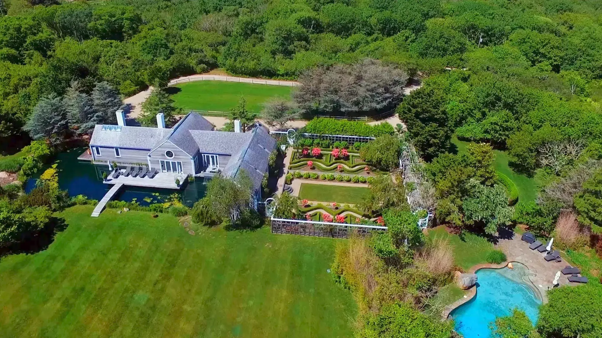 Surrounded by perfectly manicured grounds and award-winning gardens, this architecturally significant clapboard residence is like something out of a storybook. Set on 6.75 pristine acres and contiguous to hundreds of acres of Nantucket’s conservation land
