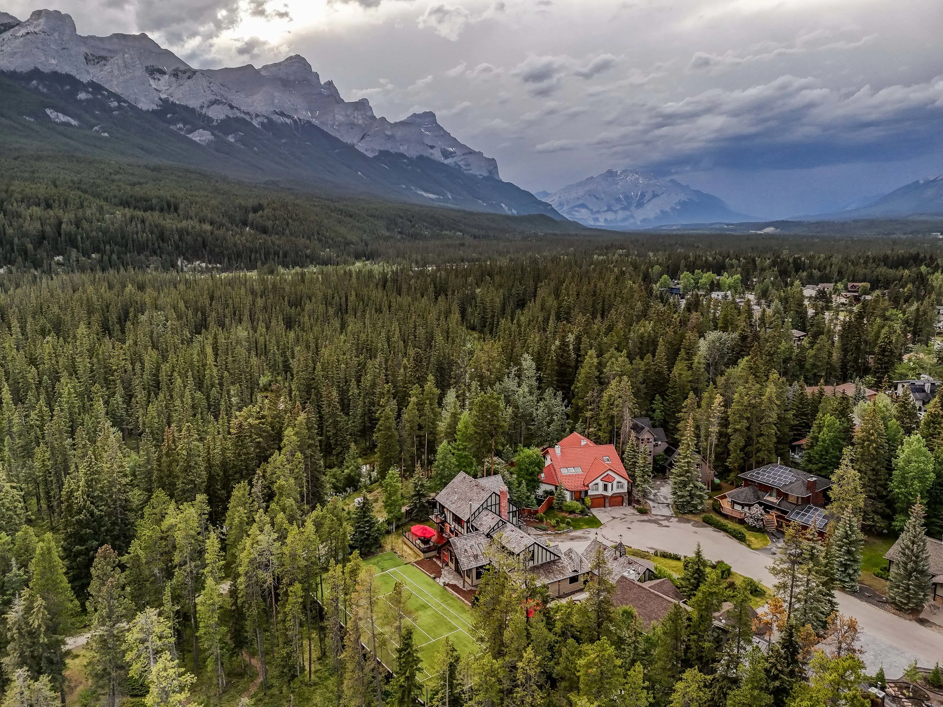 A distinguished alpine estate set on two titled lots totaling nearly 19,000 square feet within a peaceful cul-de-sac.